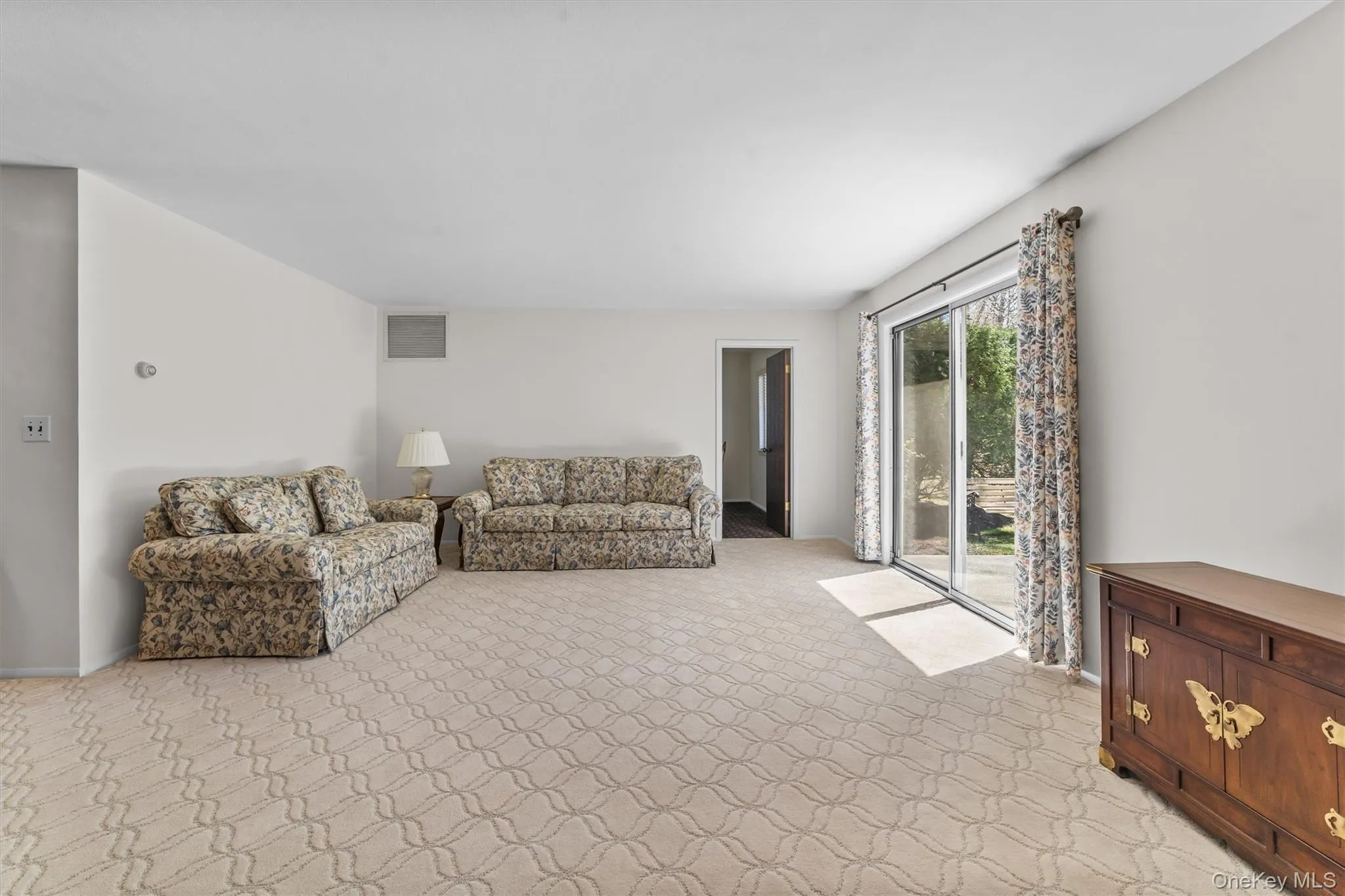 Living room view from the dining room Living room view from the dining room