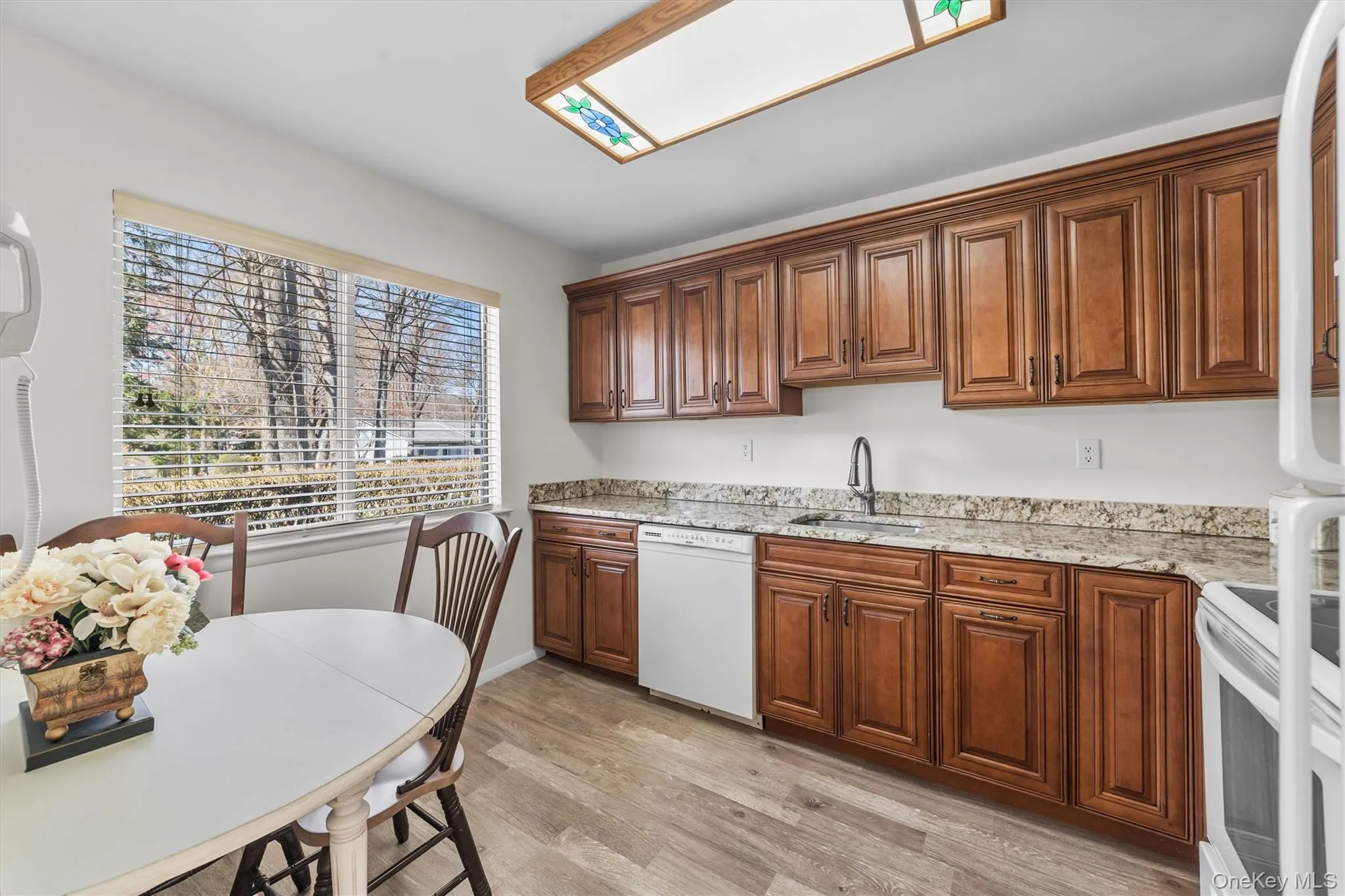 Kitchen with the Bonus of a double side to side window for so much ventilation and natural light. Kitchen with the Bonus of a double side to side window for so much ventilation and natural light.