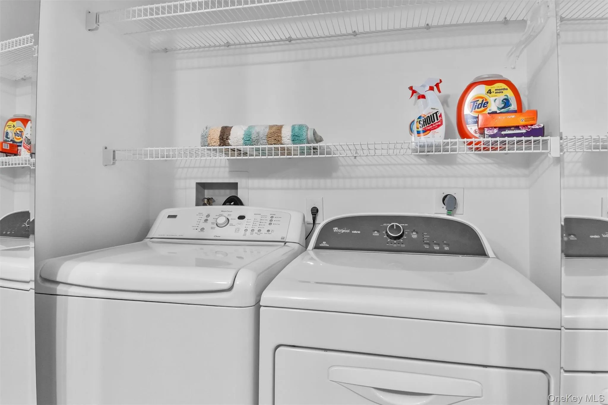 Washing machine and clothes dryer in the Hall bath area. Washing machine and clothes dryer in the Hall bath area.