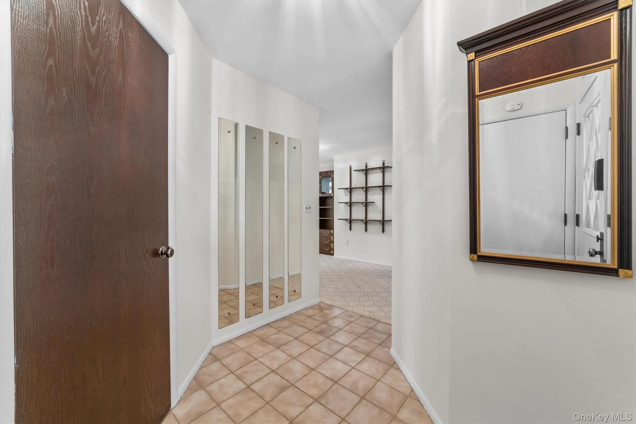 Entry leads to the wide hallway with coat/storage closet. Entry leads to the wide hallway with coat/storage closet.