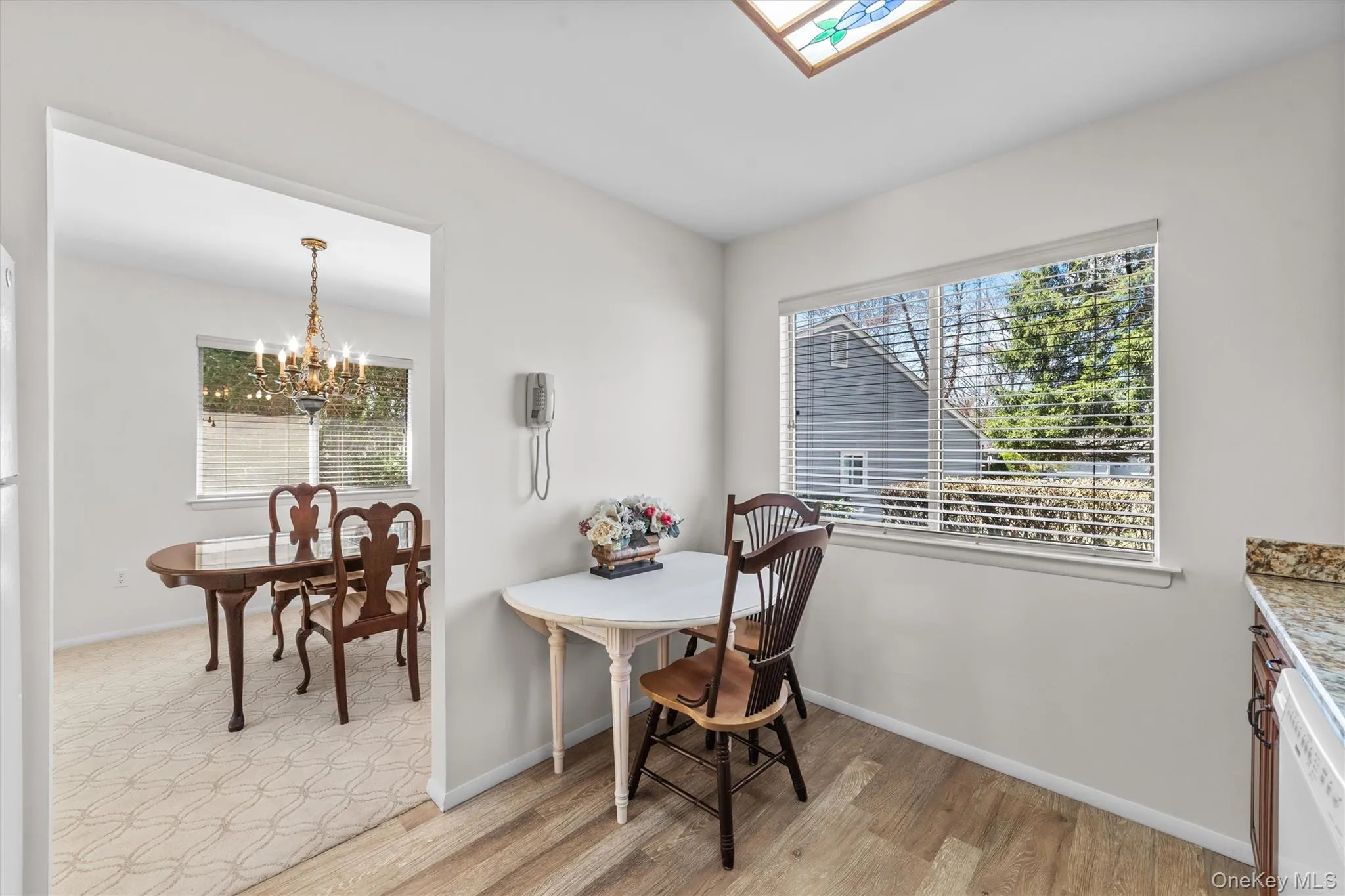 Eat In Kitchen with current flooring and granite counters. Eat In Kitchen with current flooring and granite counters.