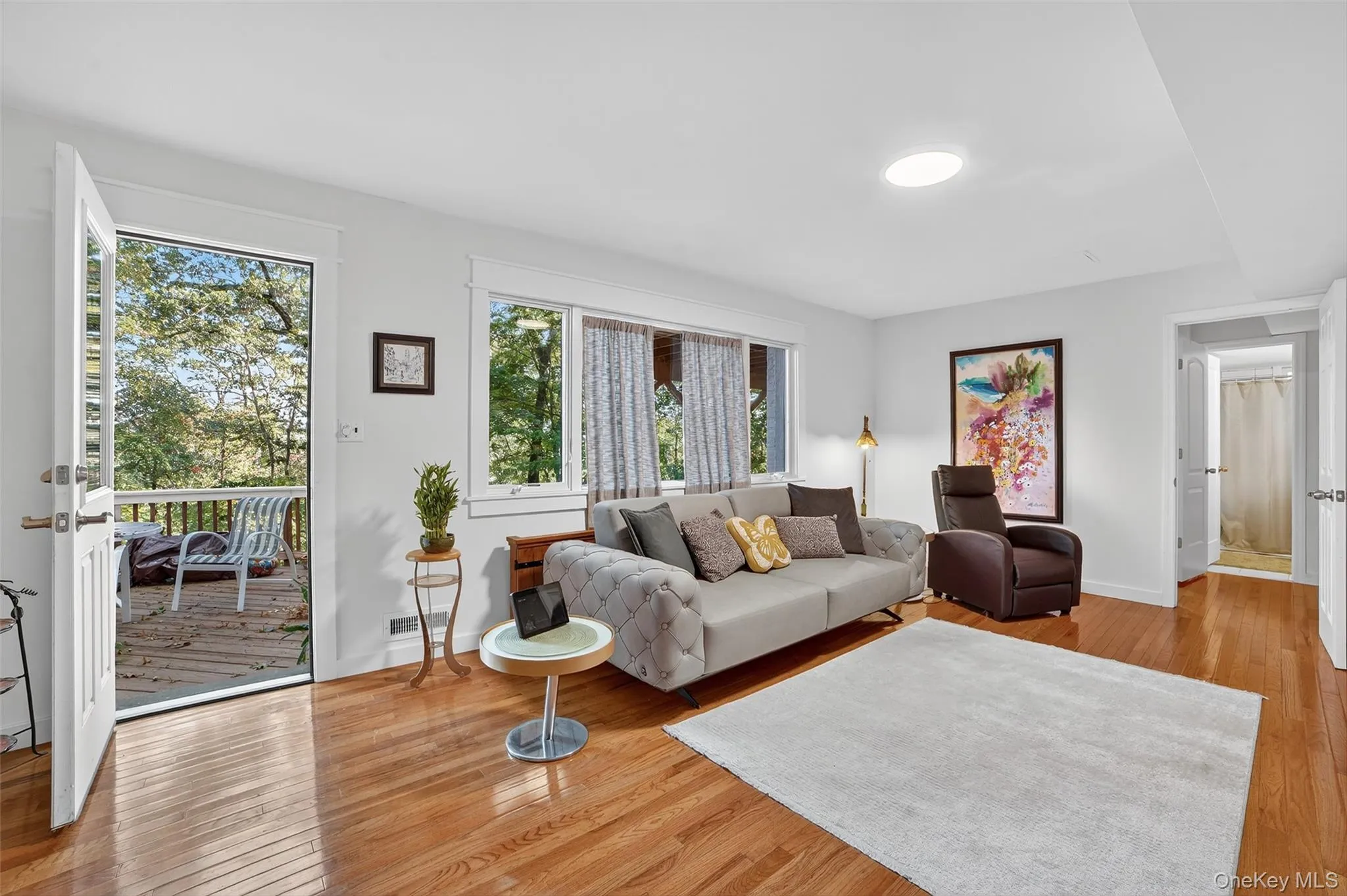 Living area featuring light wood finished floors Living area featuring light wood finished floors