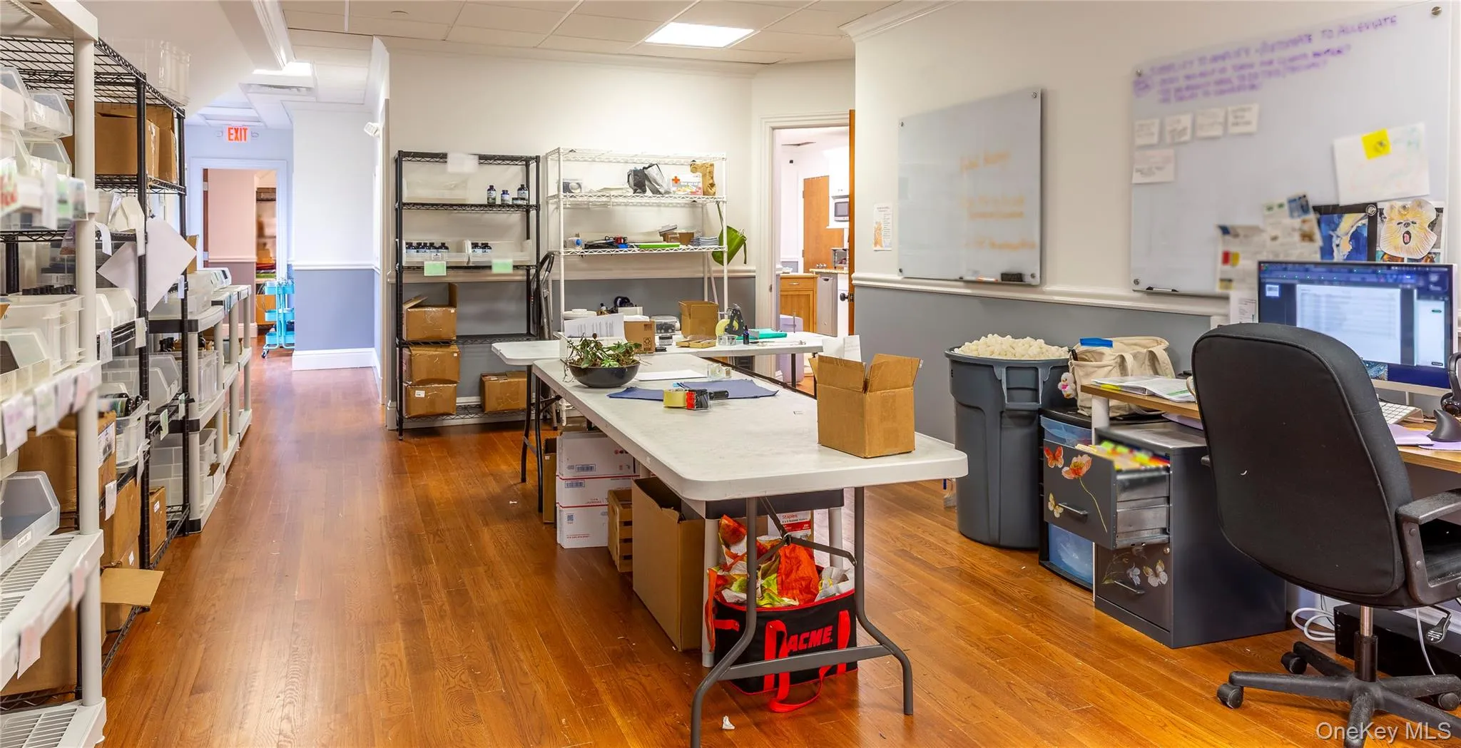 Plenty of room for display shelving, inventory, desk or cubicle space. Plenty of room for display shelving, inventory, desk or cubicle space.