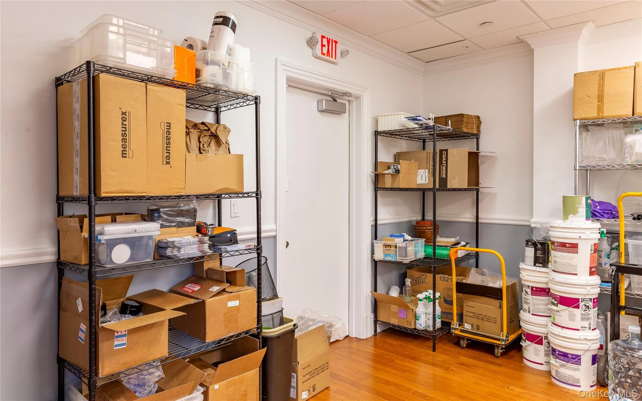 From the back office, exit door to back staircase. From the back office, exit door to back staircase.