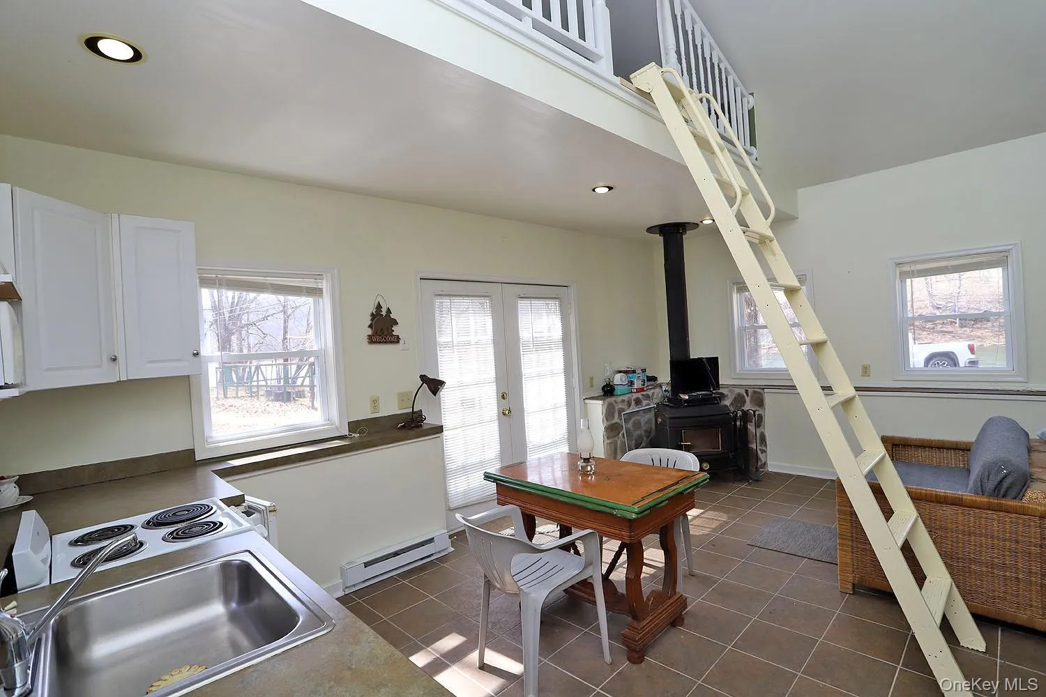 Ladder to sleeping loft. Ladder to sleeping loft.