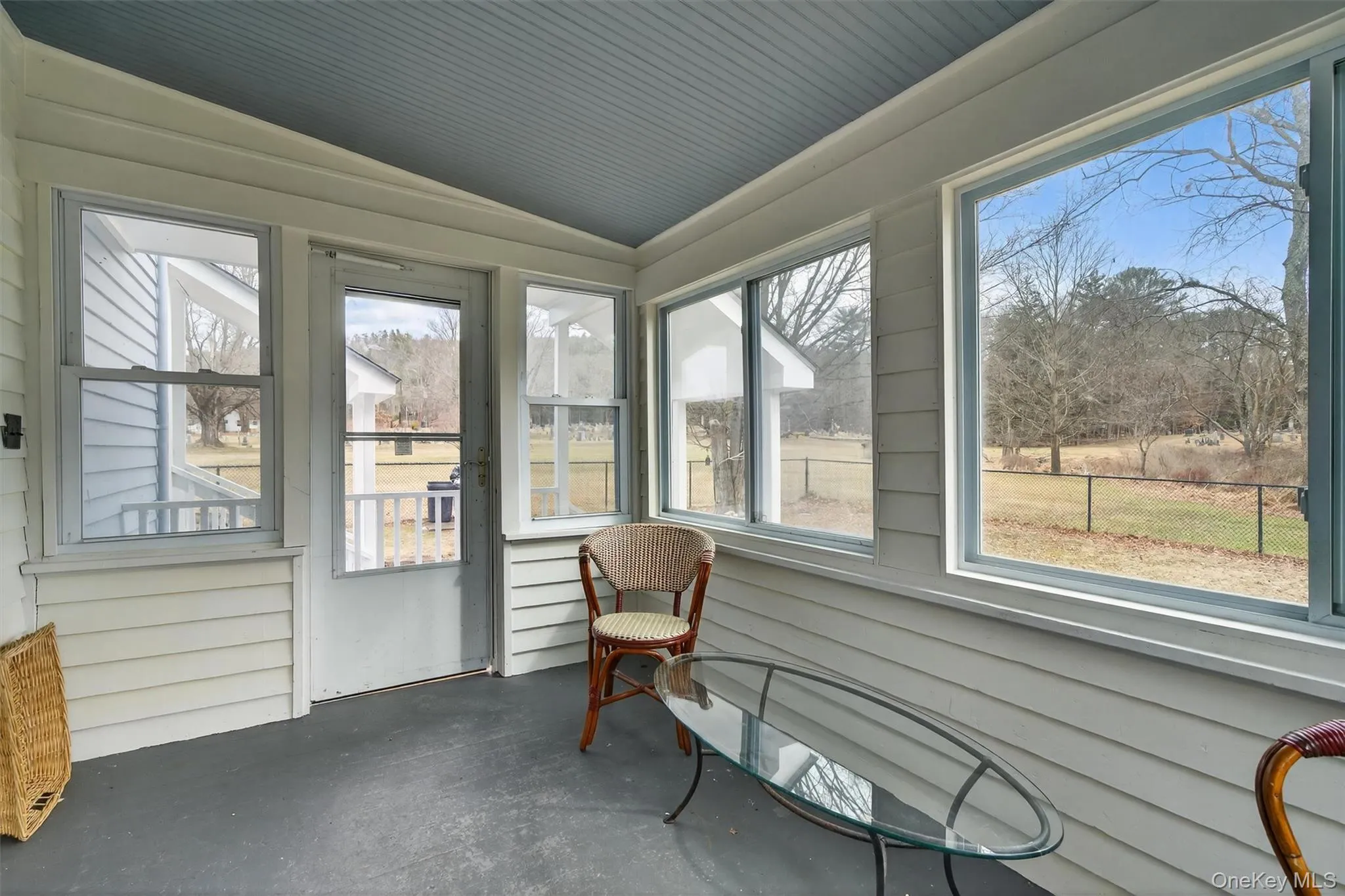 Sunroom / solarium featuring lofted ceiling Sunroom / solarium featuring lofted ceiling