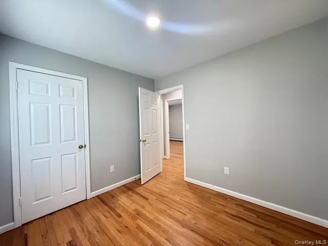 Bedroom with wood floors Bedroom with wood floors