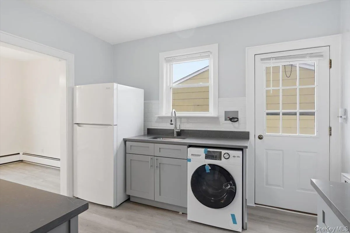 Kitchen and Laundry area Kitchen and Laundry area