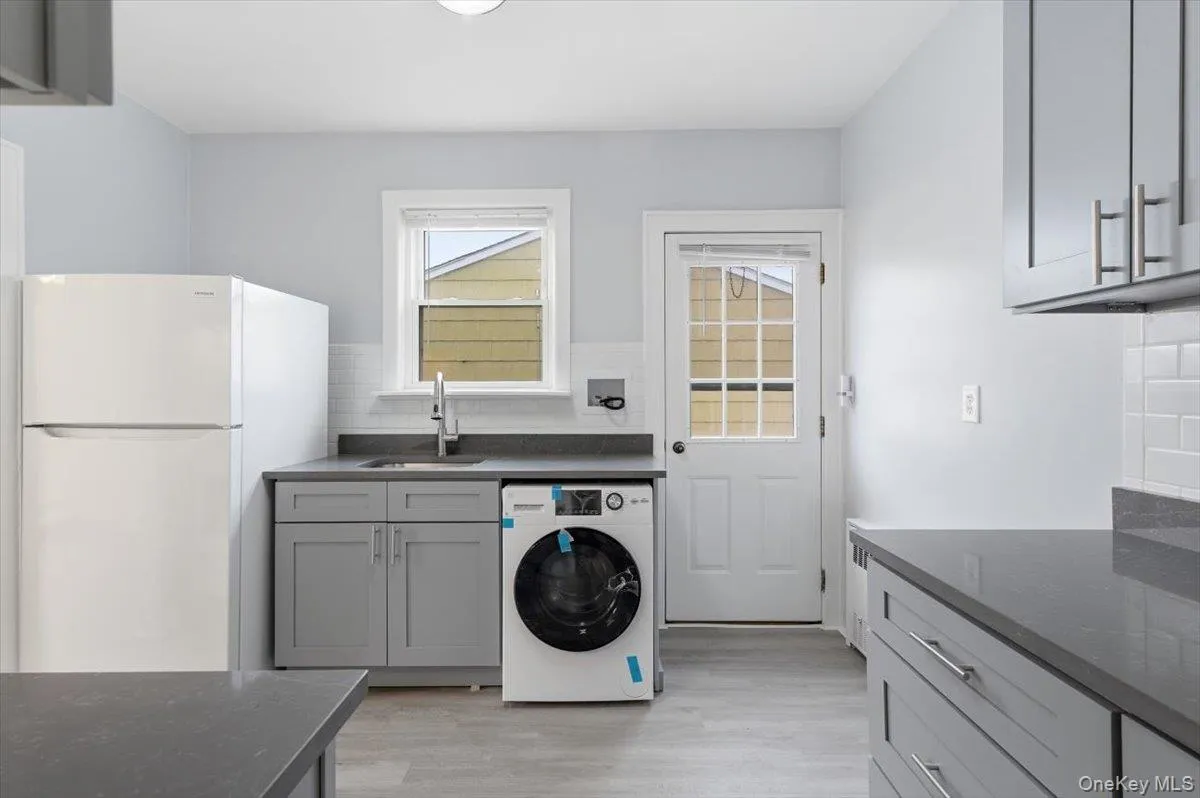 Kitchen and Laundry area Kitchen and Laundry area