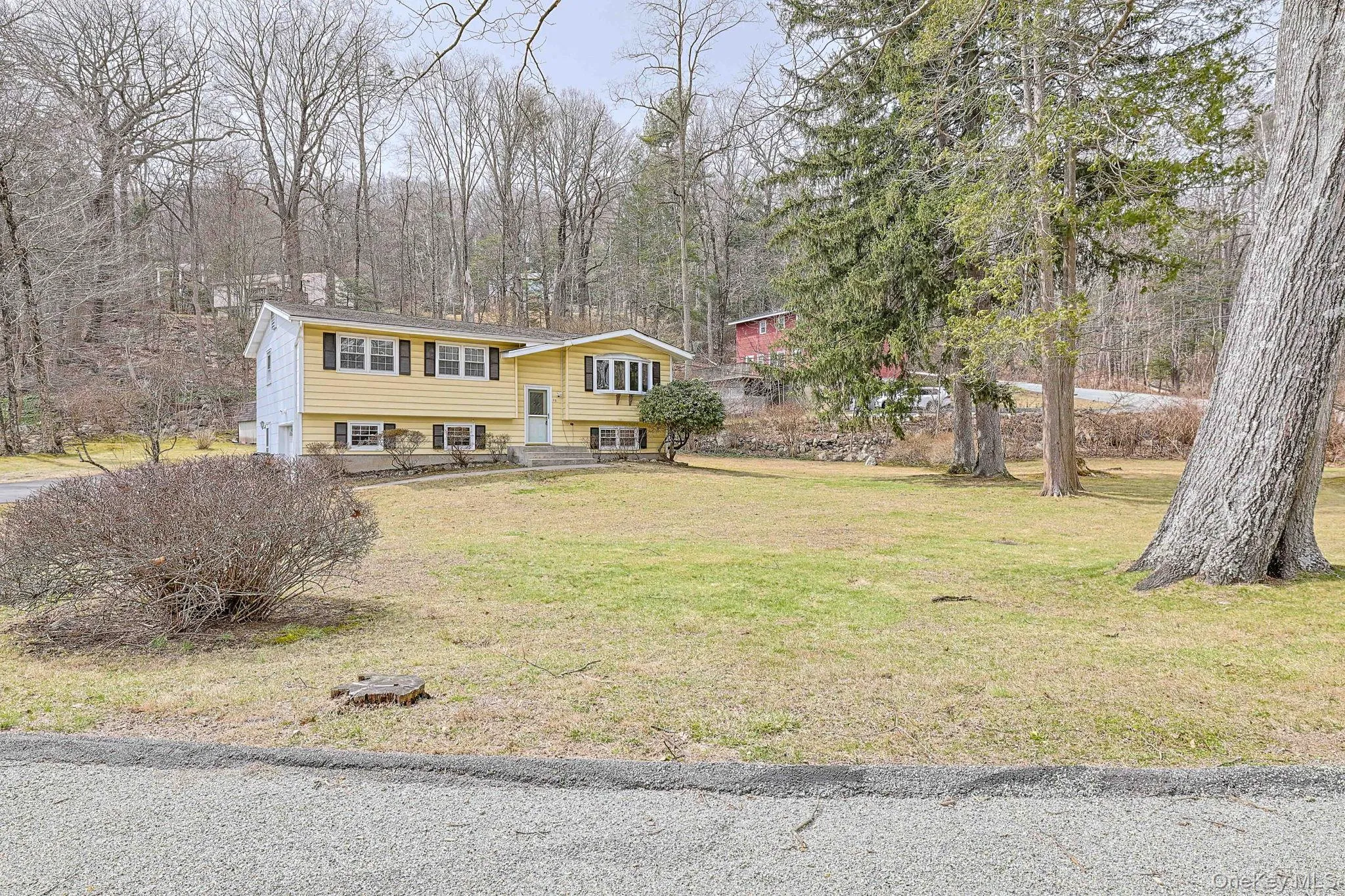 Picture of home with front yard and trees Picture of home with front yard and trees