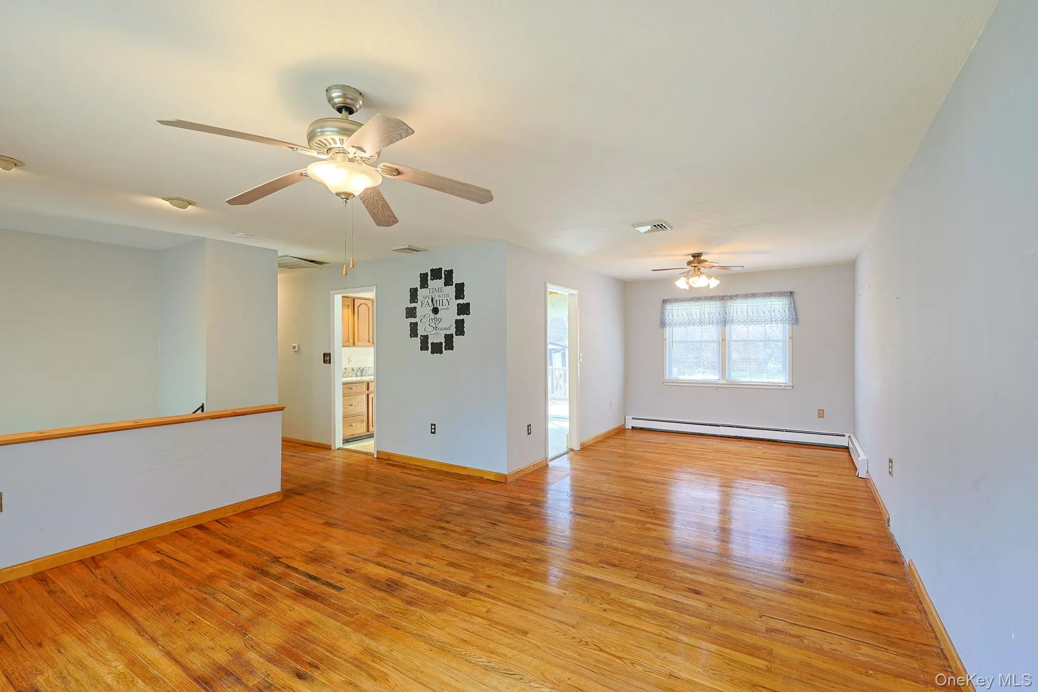 Open concept living dining area hardwood floors Open concept living dining area hardwood floors
