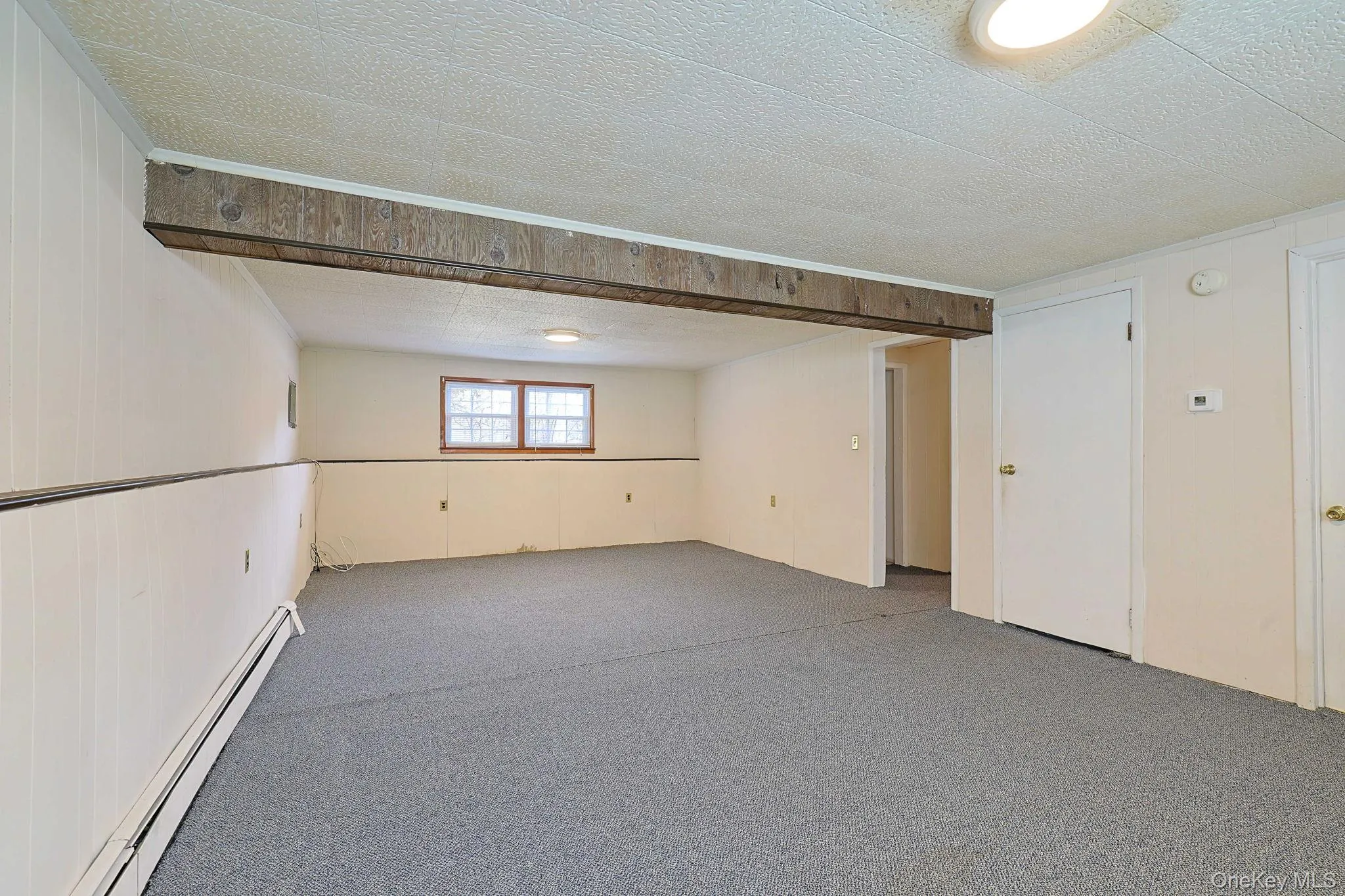 Large open space with carpeting Large open space with carpeting