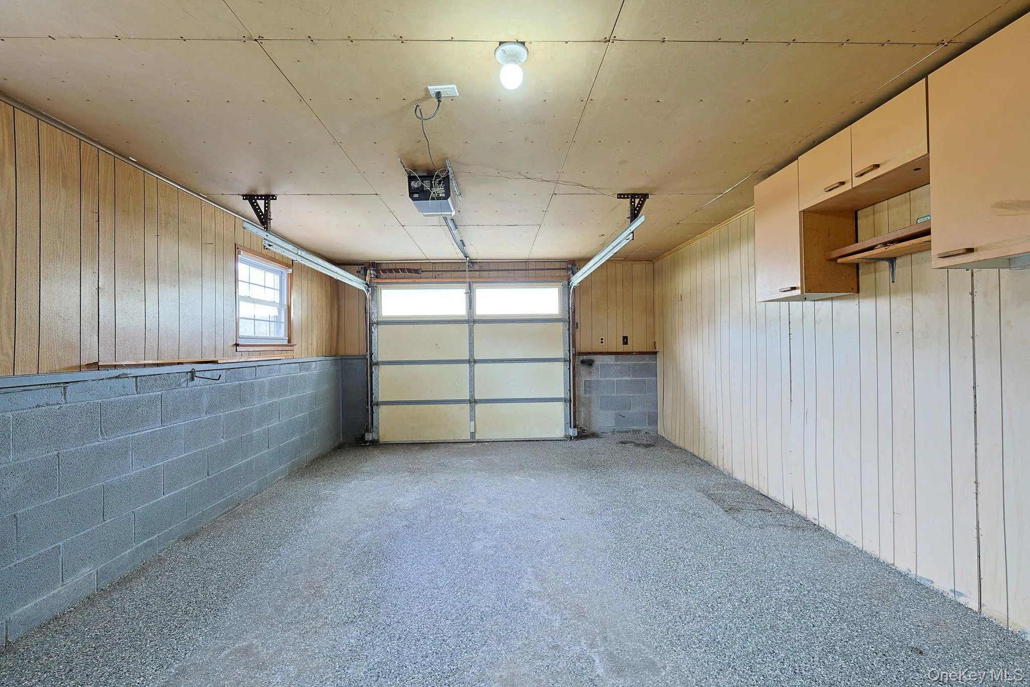 Oversized one car garage with epoxy flooring Oversized one car garage with epoxy flooring