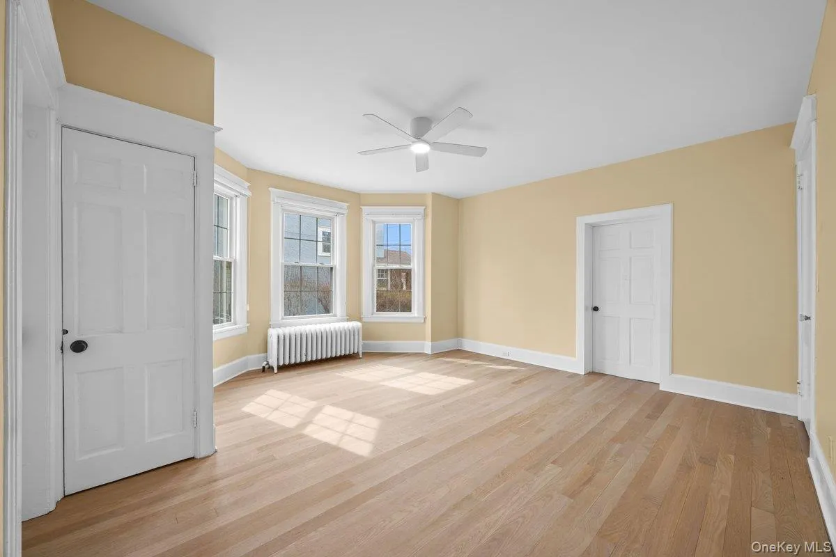 Bright and airy living room with ceiling fan Bright and airy living room with ceiling fan
