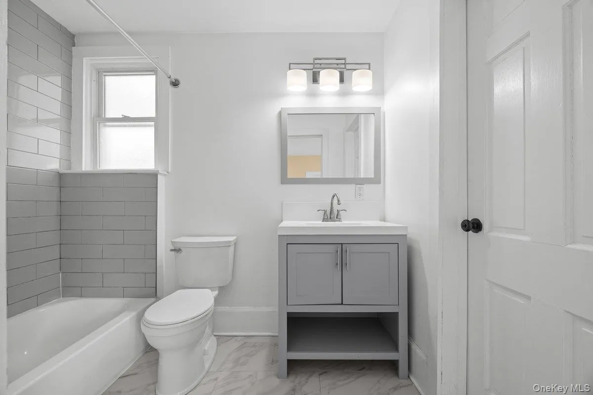 Full bathroom with vanity, shower / bath combination, Full bathroom with vanity, shower / bath combination,