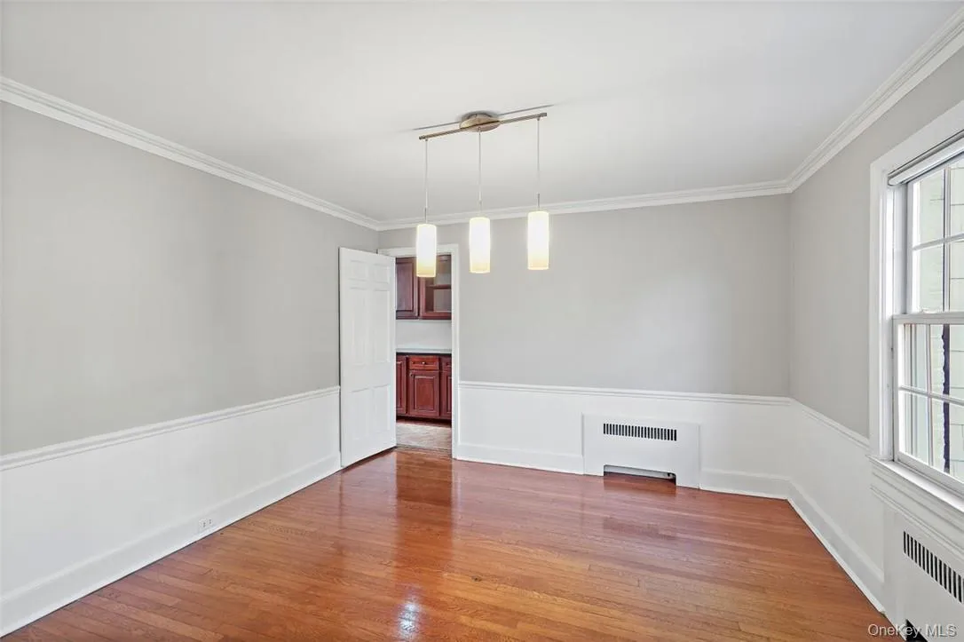 Dining room with gleaming hardwood floors Dining room with gleaming hardwood floors