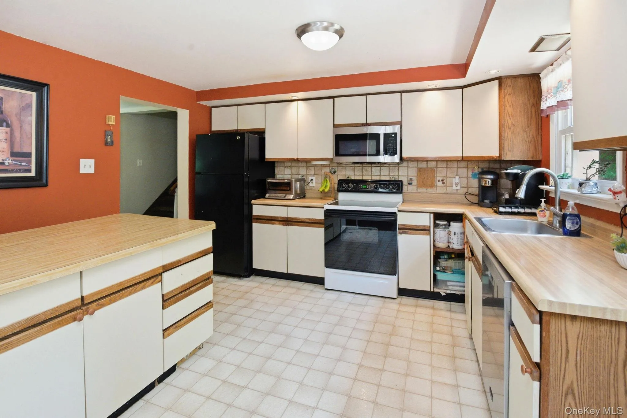 Stainless steel appliances and abundant counter space make this kitchen functional. Stainless steel appliances and abundant counter space make this kitchen functional.
