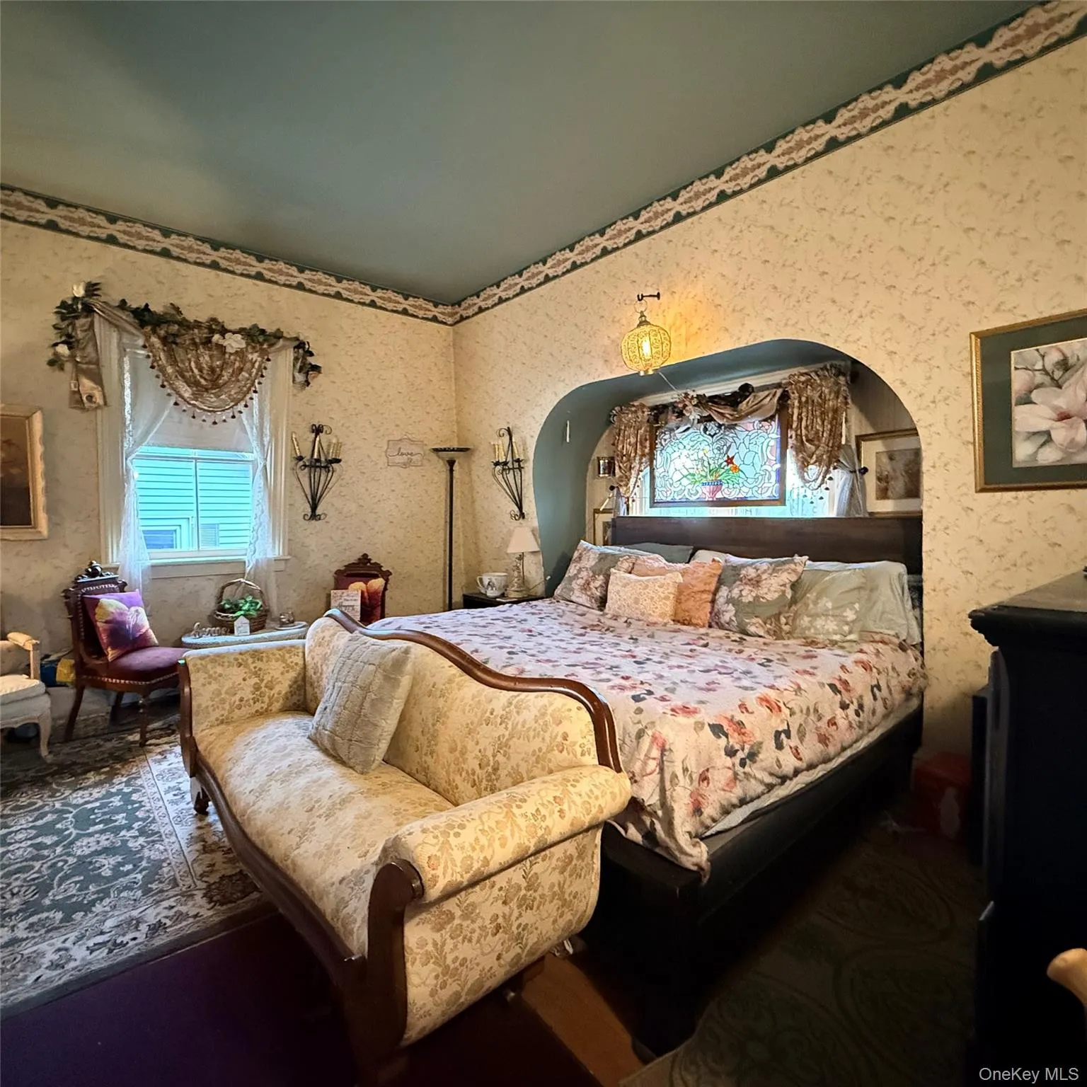 Bedroom with wallpapered walls Bedroom with wallpapered walls