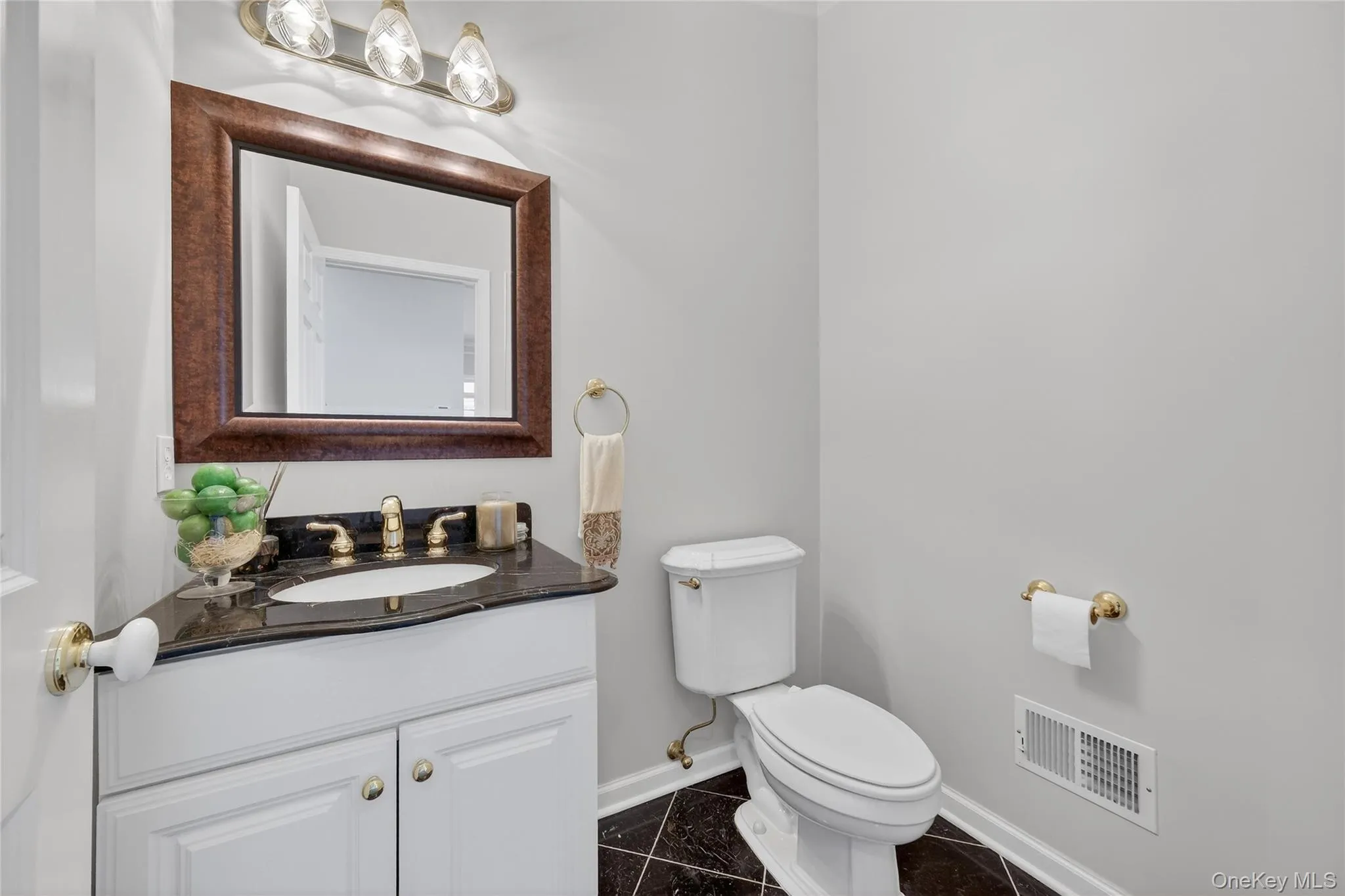 Main-level powder room. Main-level powder room.