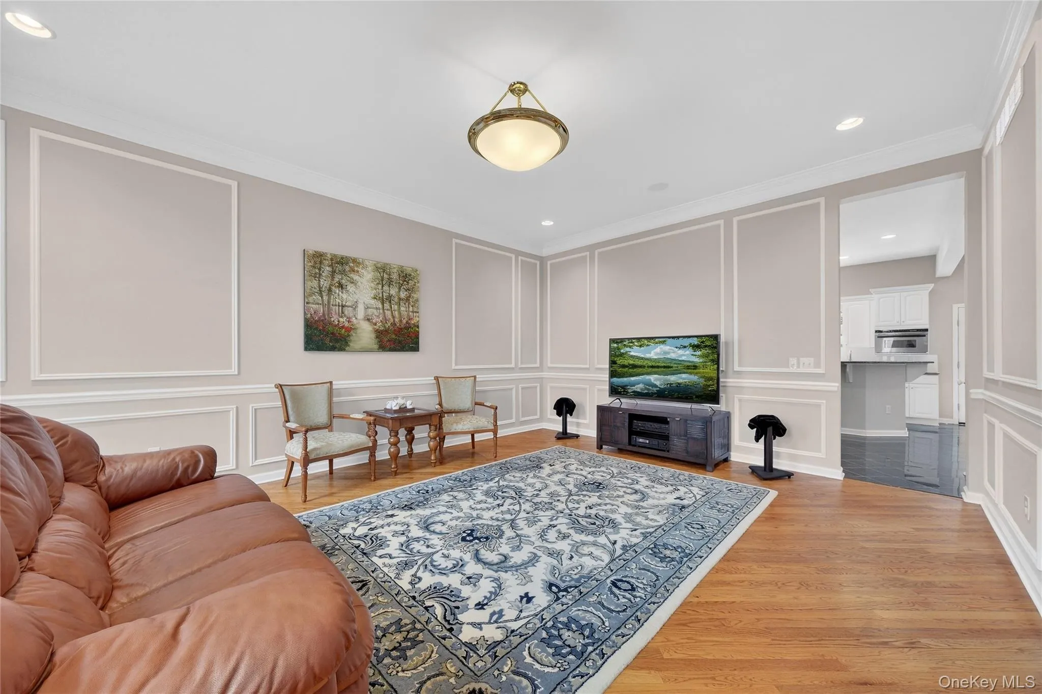 The dining room is currently being used as a sitting room. The dining room is currently being used as a sitting room.