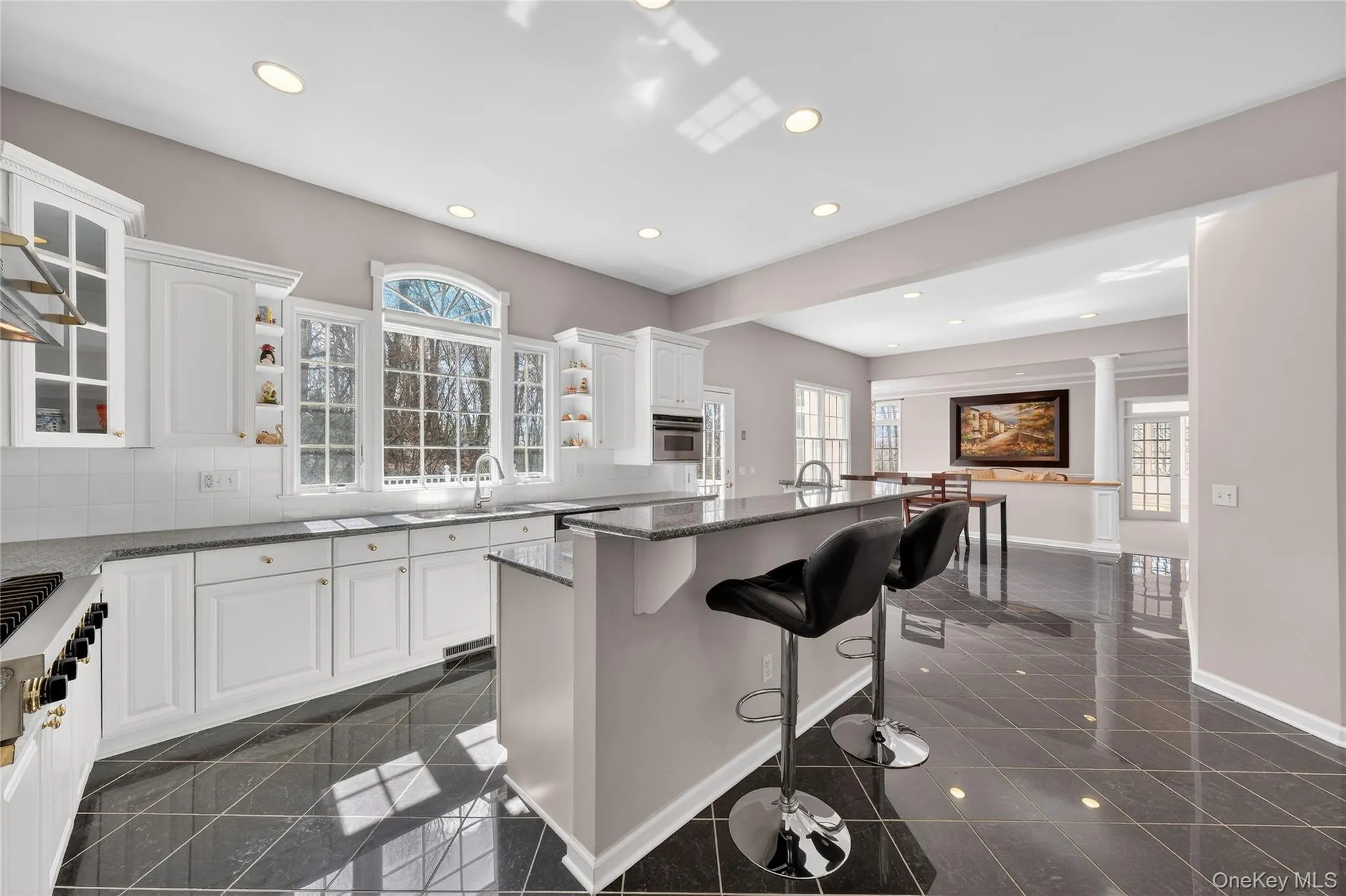 The center island can conveniently serve as a breakfast bar. The center island can conveniently serve as a breakfast bar.