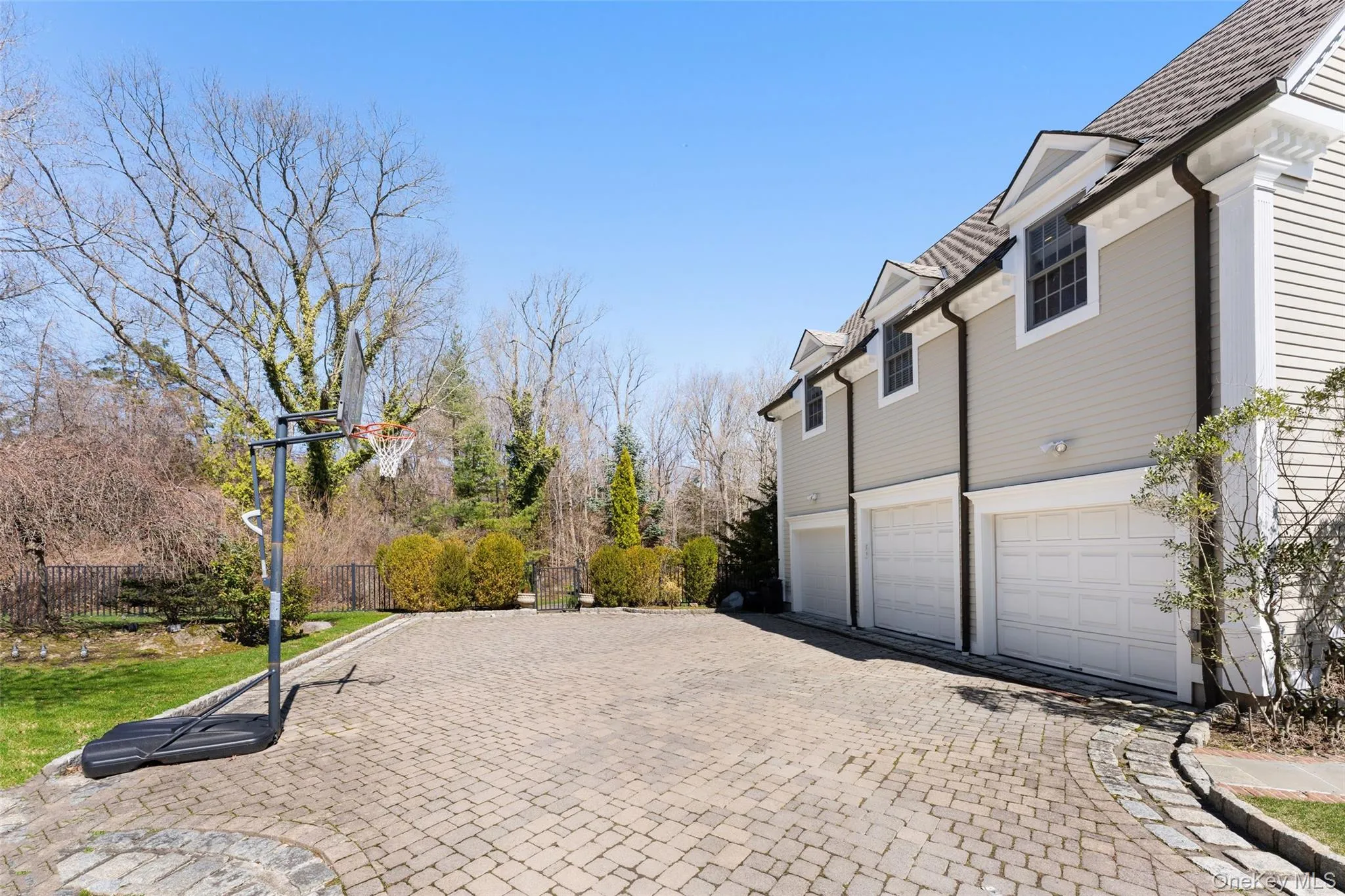 3-car garage, plus large motor court provides ample parking 3-car garage, plus large motor court provides ample parking