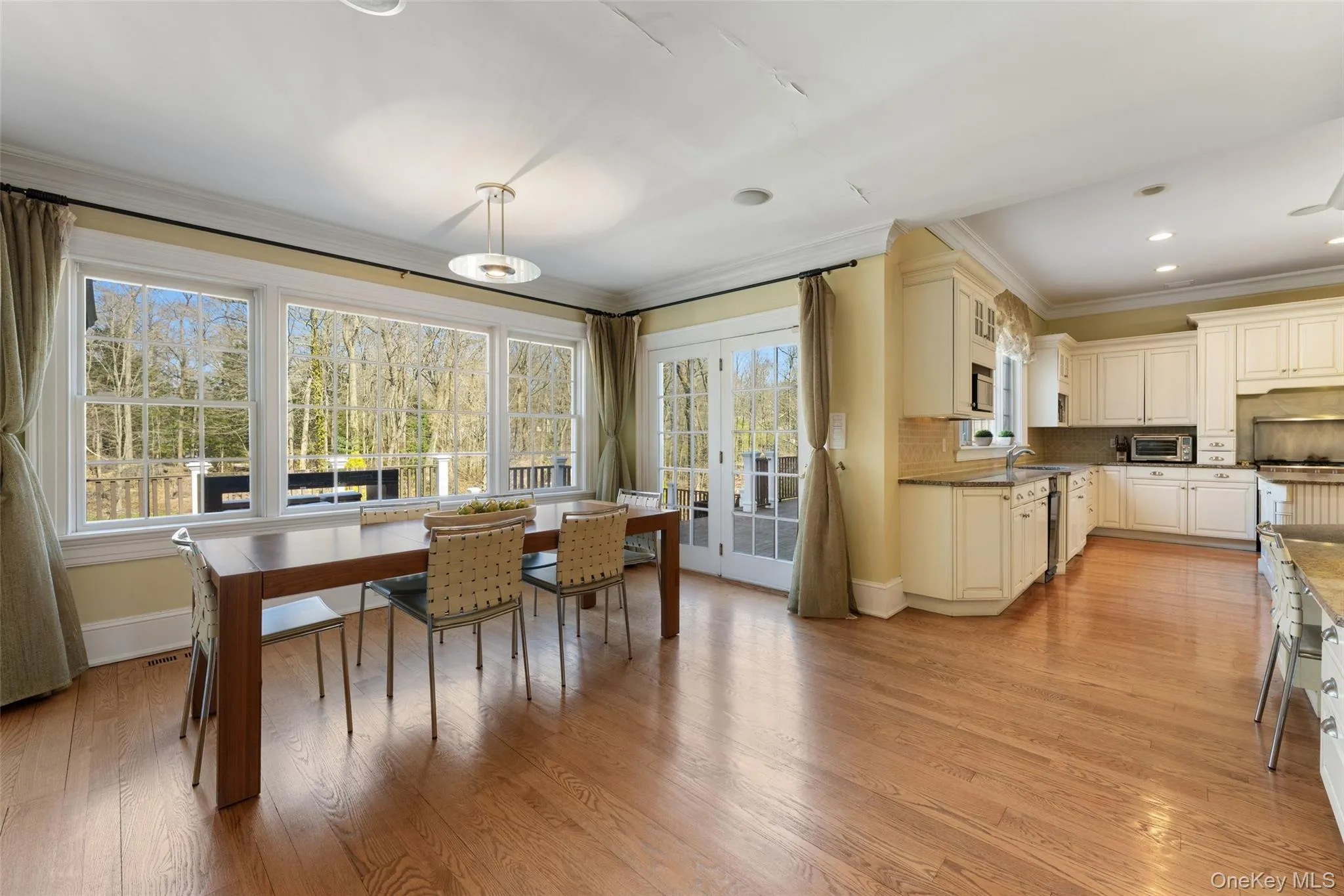 Sun-soaked breakfast room plus built-in work space Sun-soaked breakfast room plus built-in work space