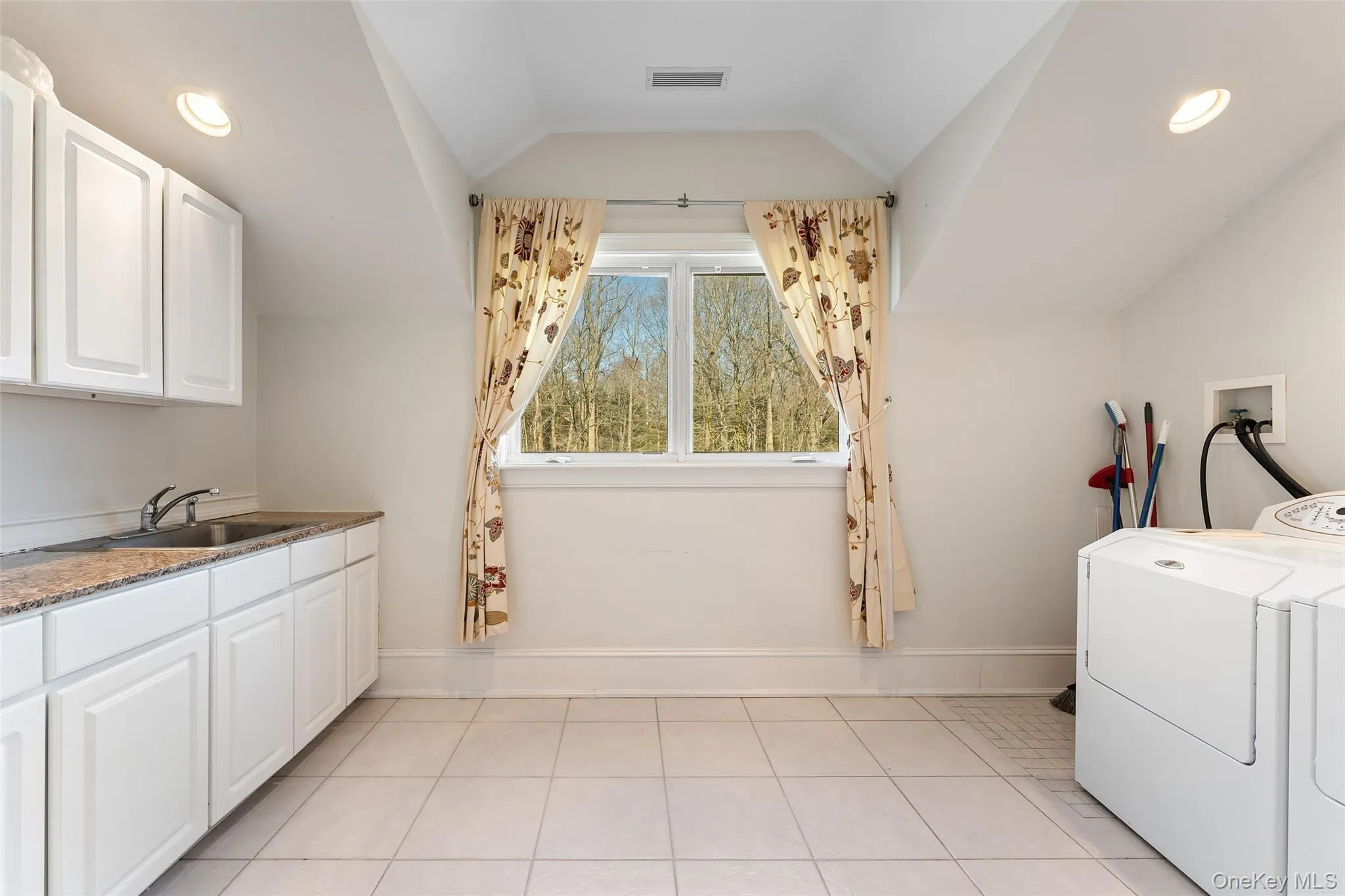 Convenient second floor laundry room Convenient second floor laundry room