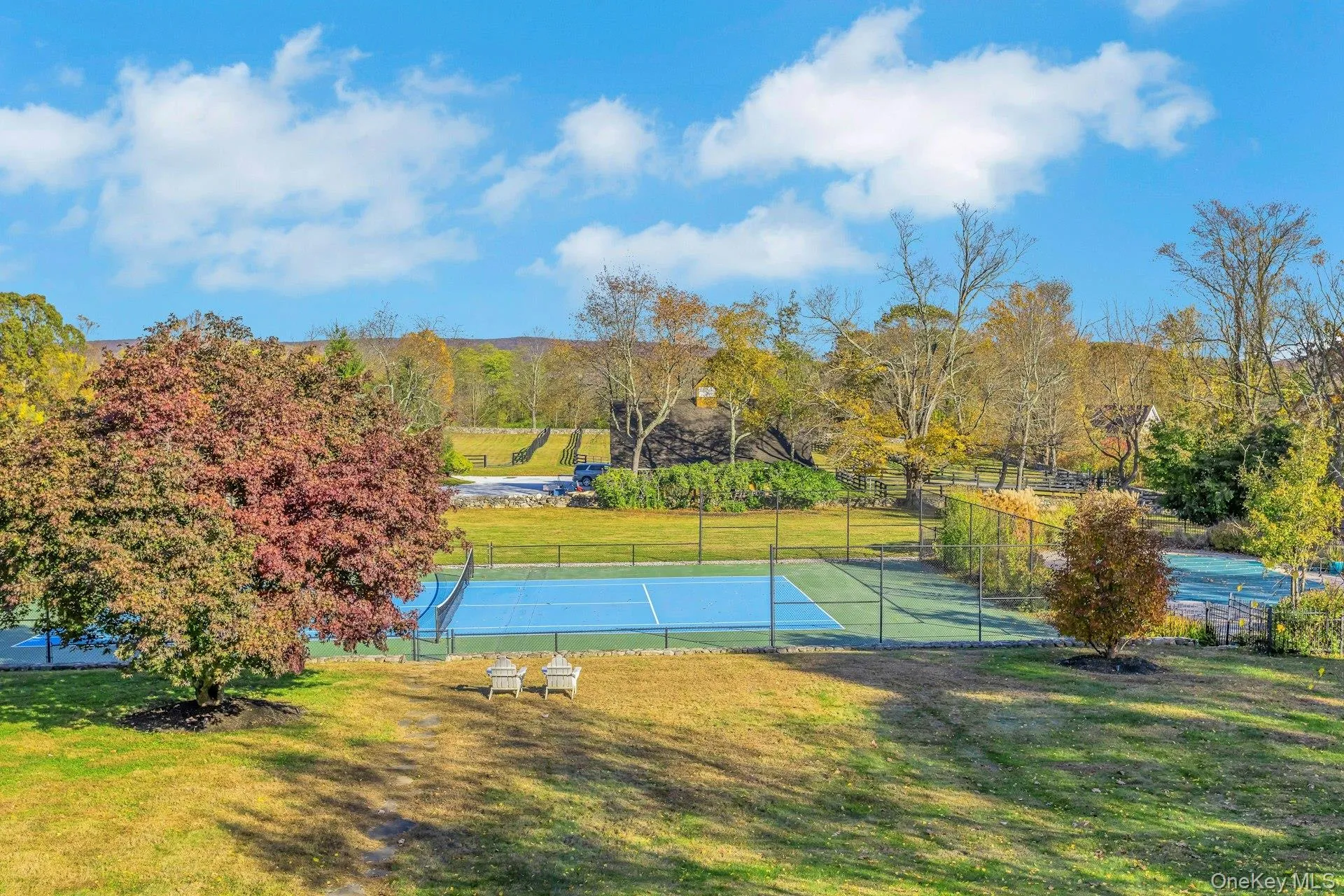 View of tennis court View of tennis court