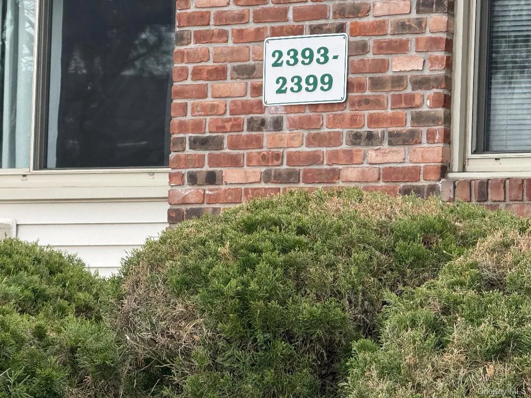 Located on the back of the building Located on the back of the building