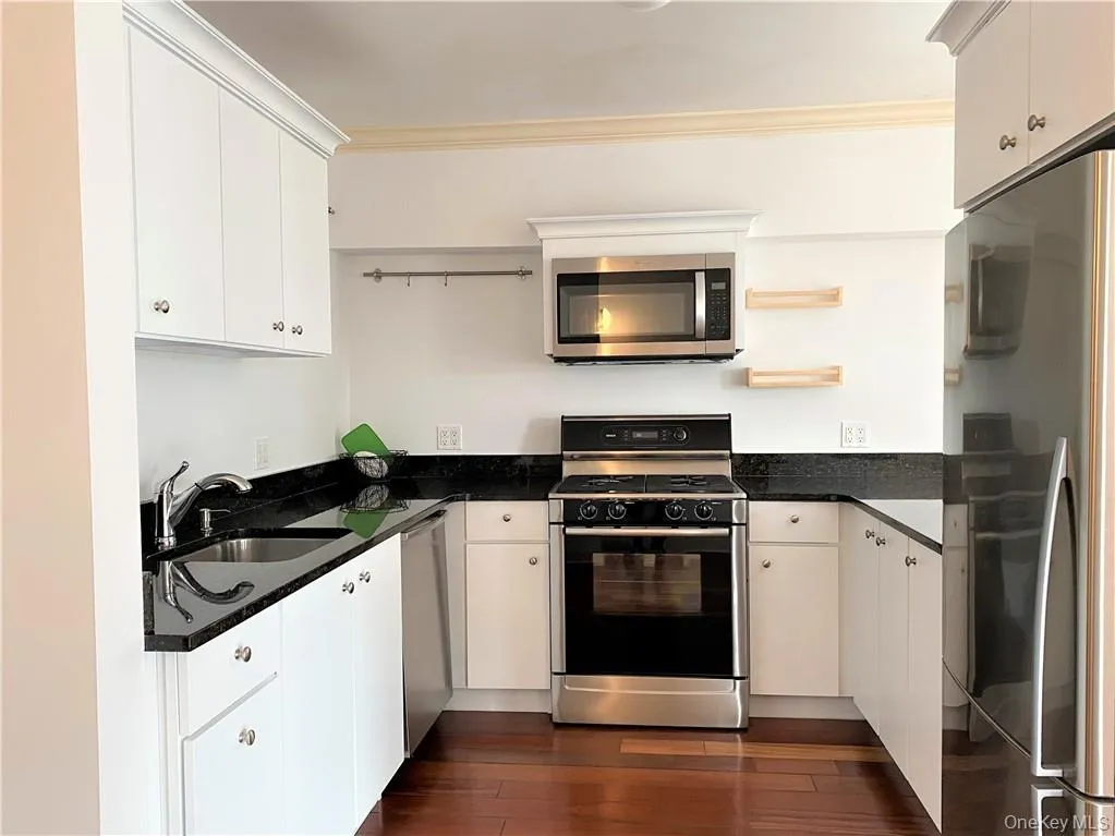 Kitchen with pass-through to dining area Kitchen with pass-through to dining area