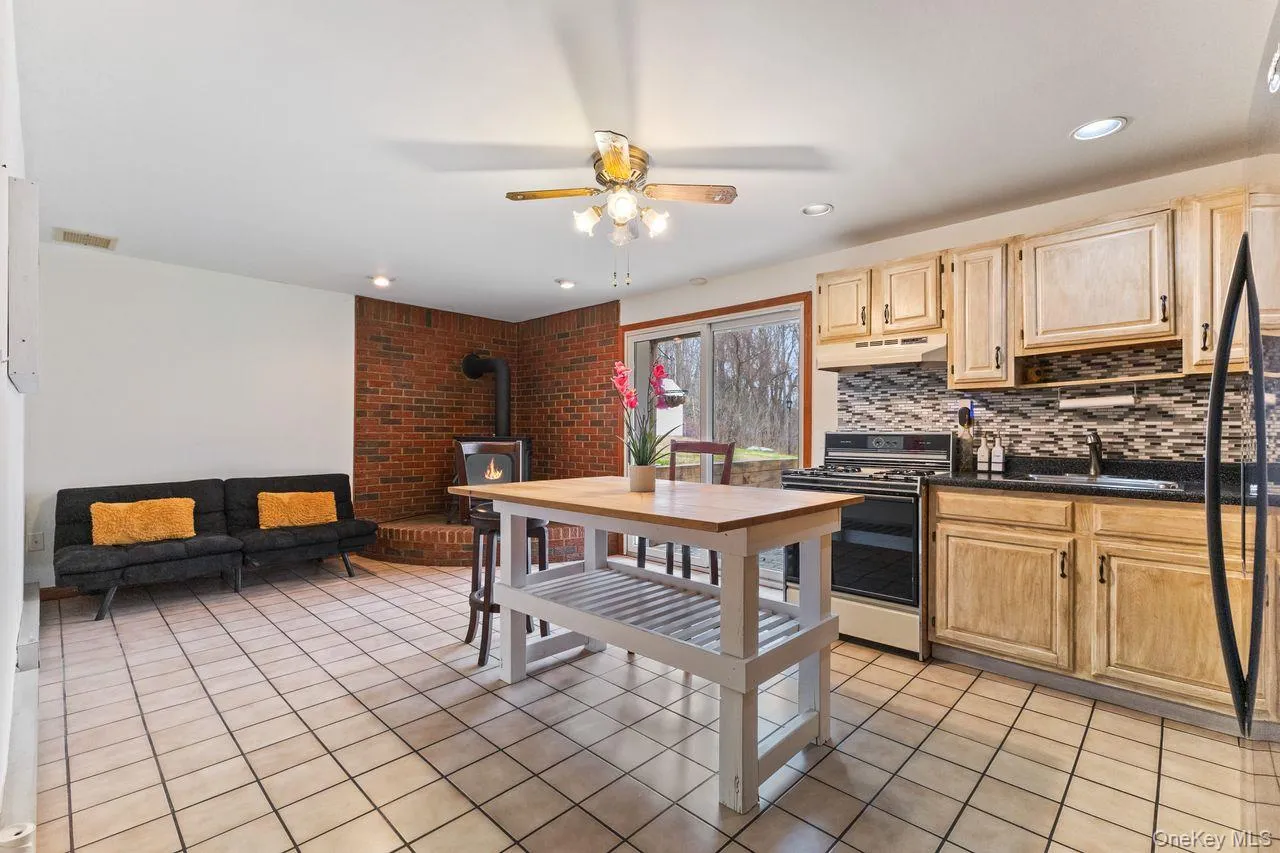 Lower level in law apartment with full kitchen and living space. Lower level in law apartment with full kitchen and living space.