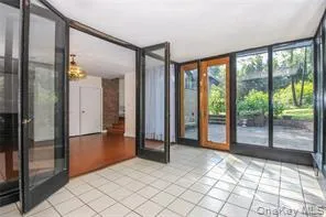 Light filled retreat with view of the yard Light filled retreat with view of the yard