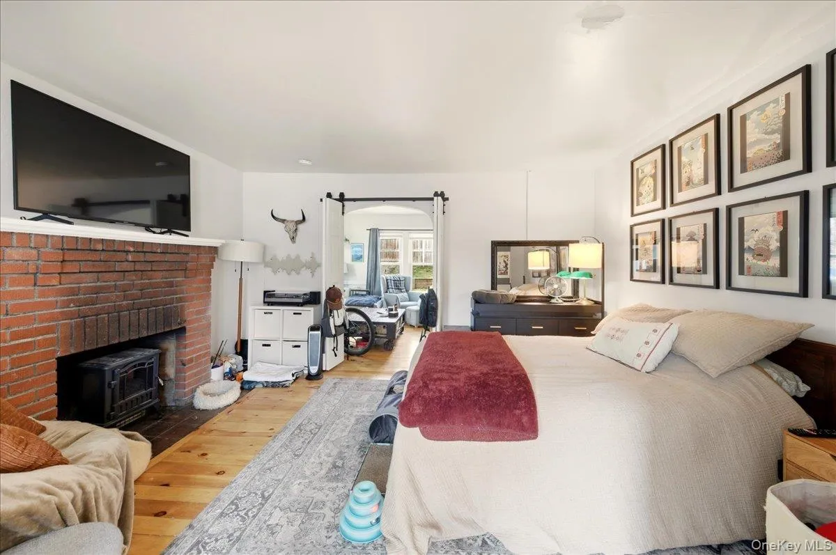 Bedroom featuring light wood-type flooring Bedroom featuring light wood-type flooring