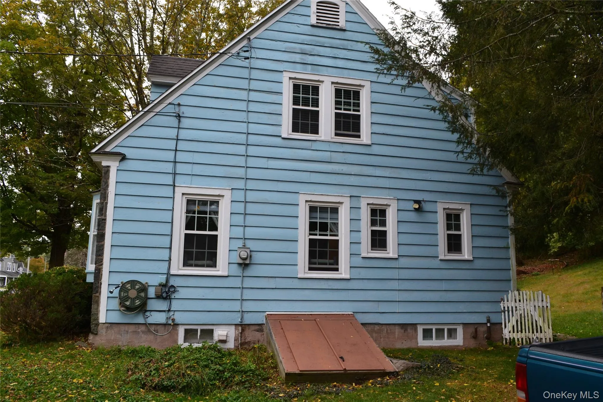 Side of house showing bilco doors to basement Side of house showing bilco doors to basement