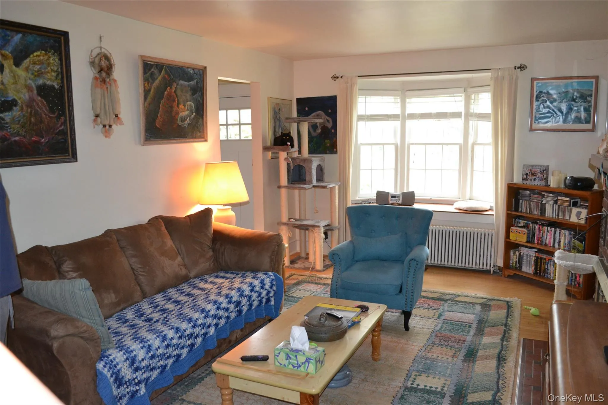 Living room showing bay window and hard wood flooring Living room showing bay window and hard wood flooring