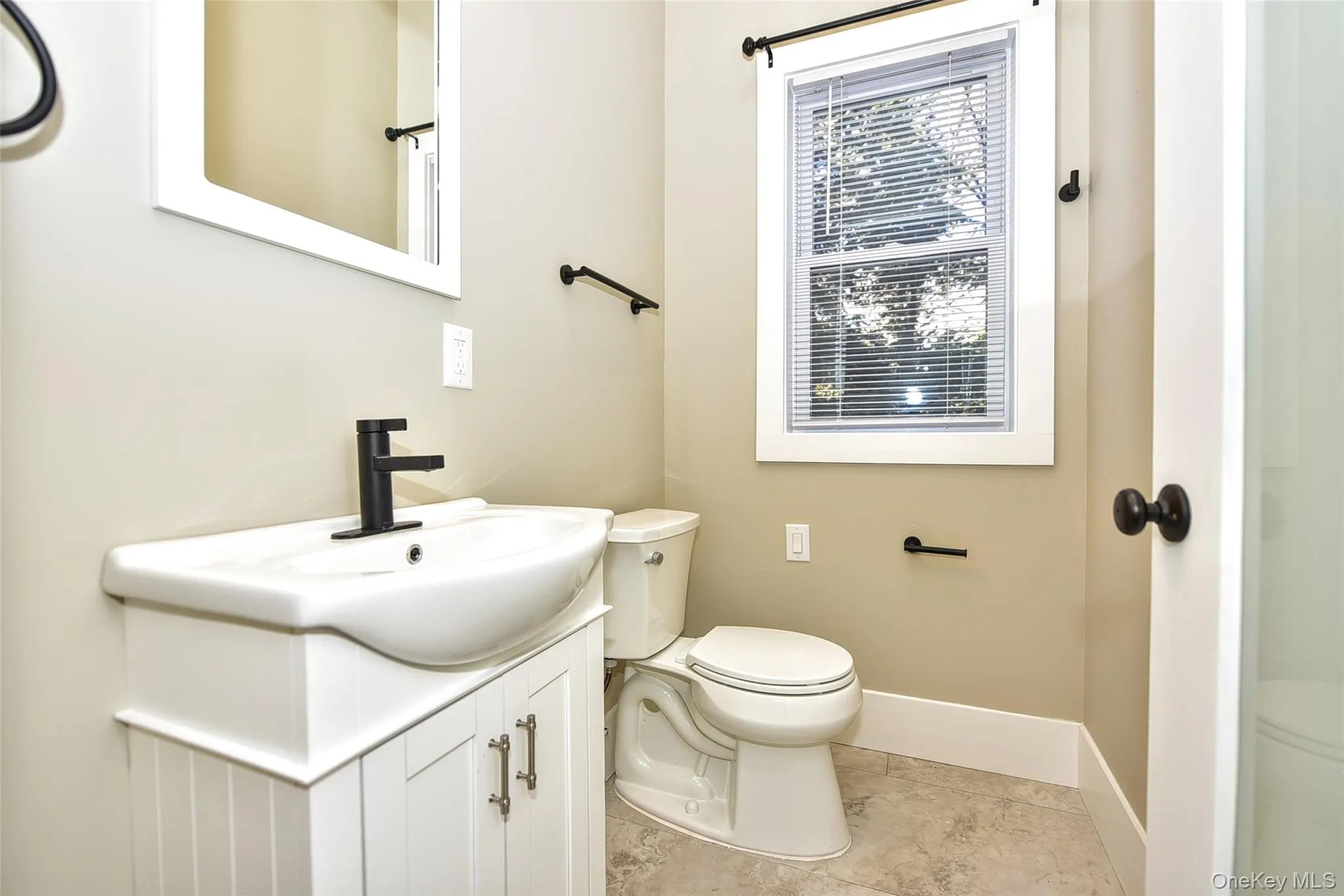 Convenient modern half bath on first floor Convenient modern half bath on first floor