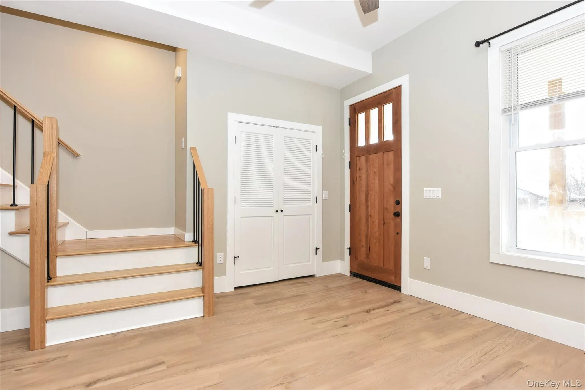 Double coat closet and wood flooring Double coat closet and wood flooring