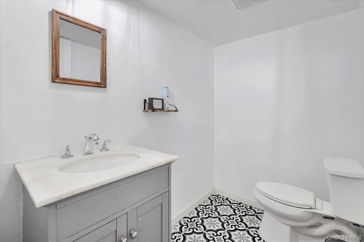 Lower Level Powder Room Lower Level Powder Room