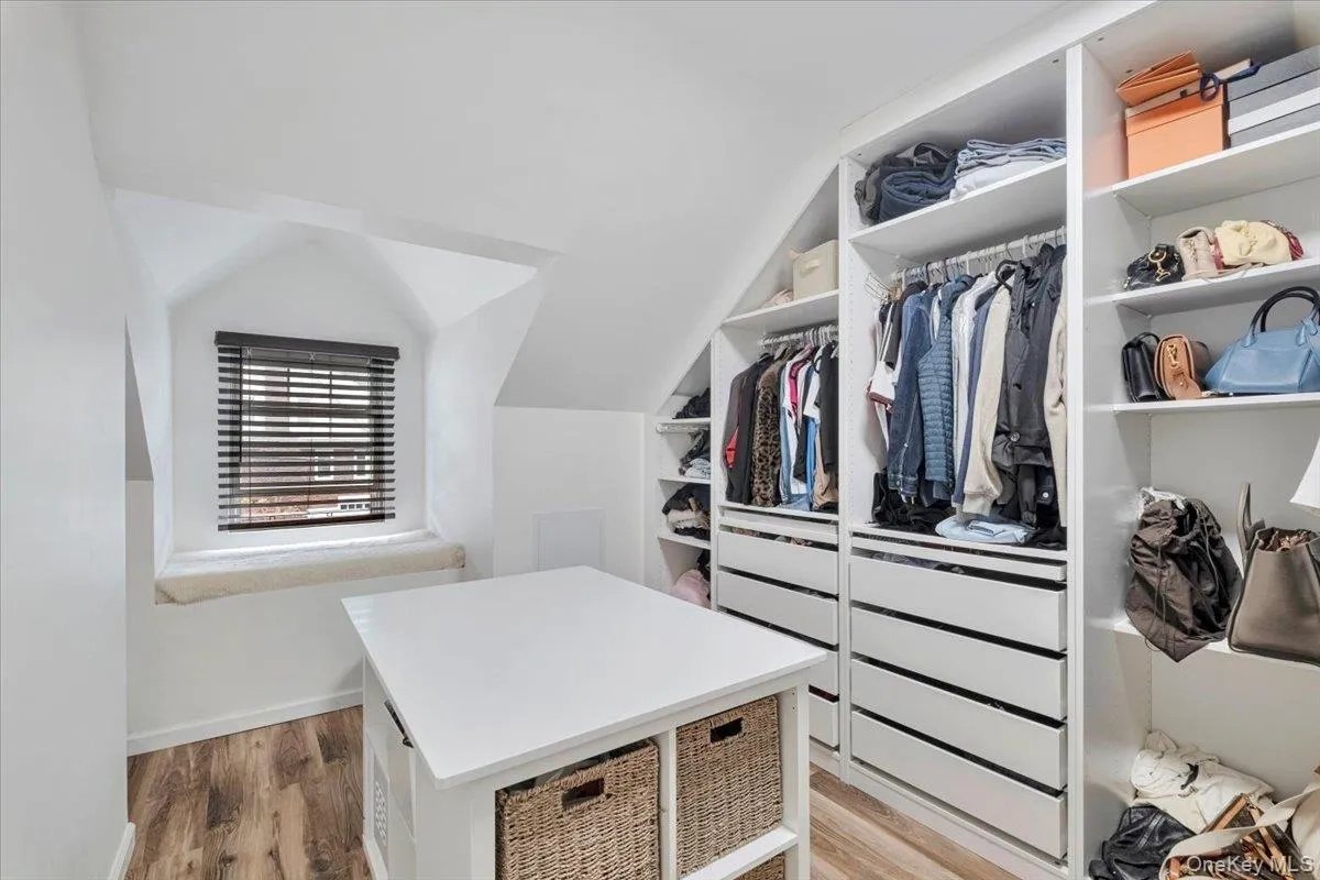 Beautiful Walk-in Closet in Primary Bedroom Beautiful Walk-in Closet in Primary Bedroom