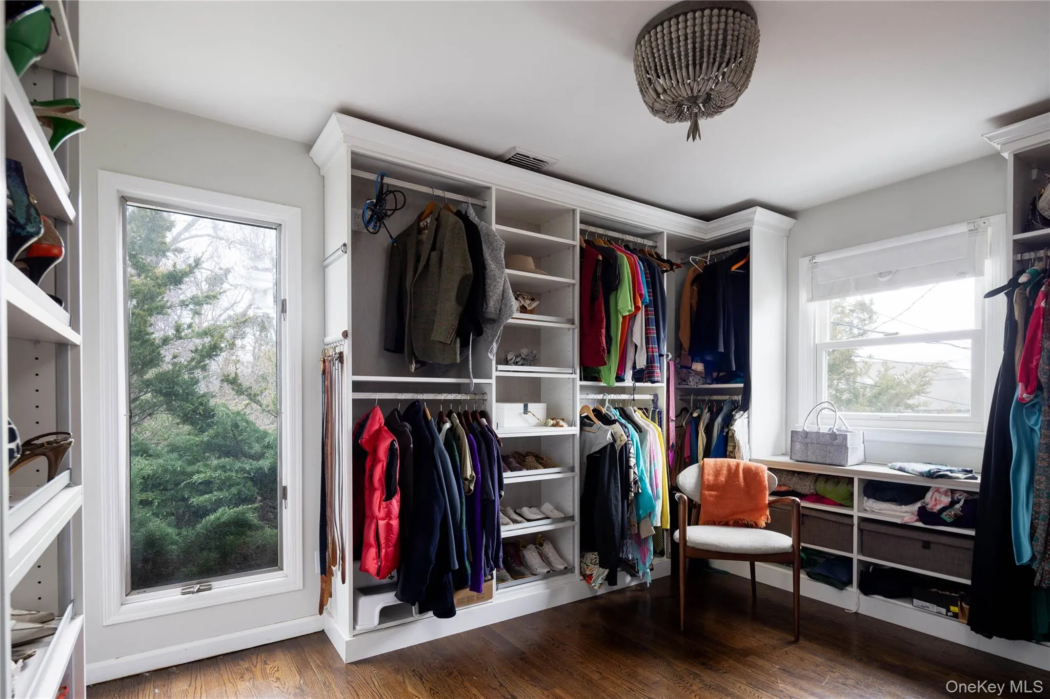 Bedroom currently a dressing room with custom built-ins Bedroom currently a dressing room with custom built-ins