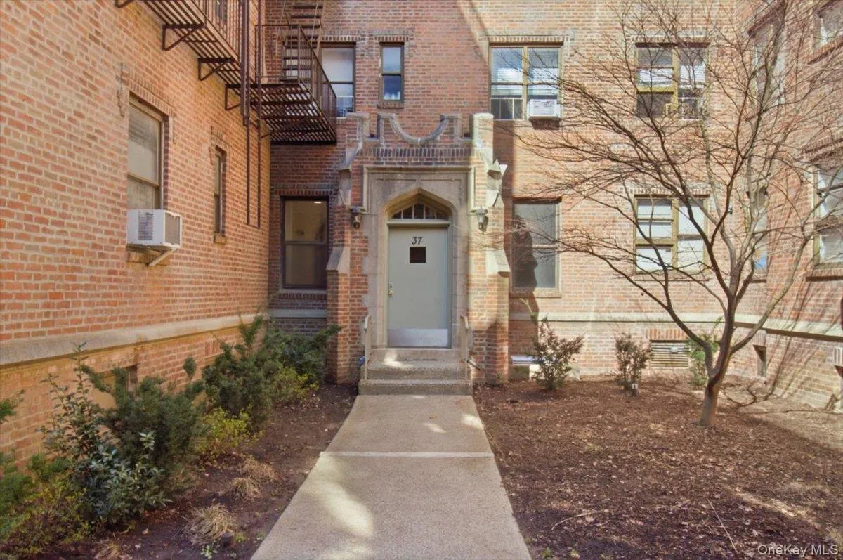 View of exterior entry with brick siding View of exterior entry with brick siding