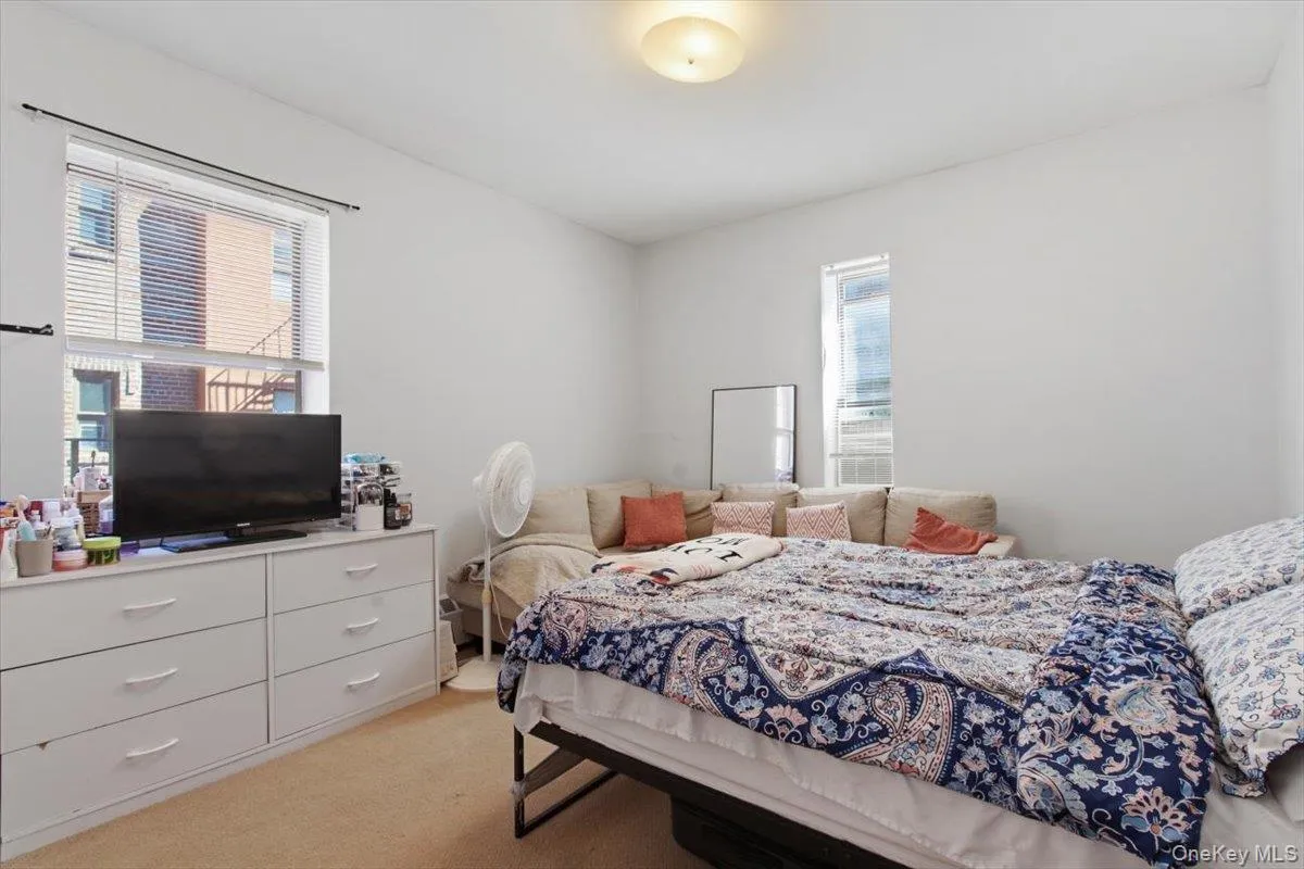 Bedroom with light colored carpet Bedroom with light colored carpet