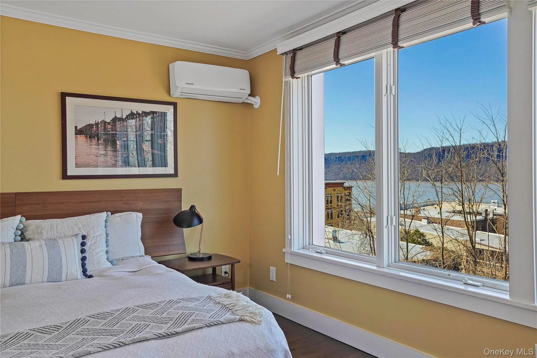 Primary suite with beautiful river views Primary suite with beautiful river views