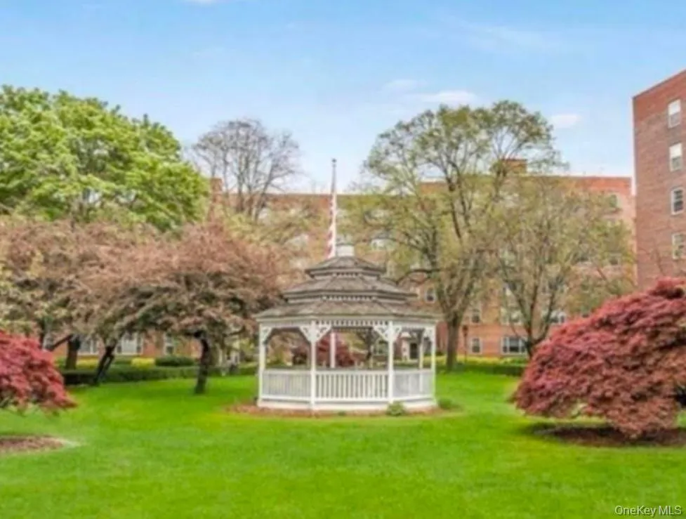 View of property's community with a gazebo and a yard View of property's community with a gazebo and a yard