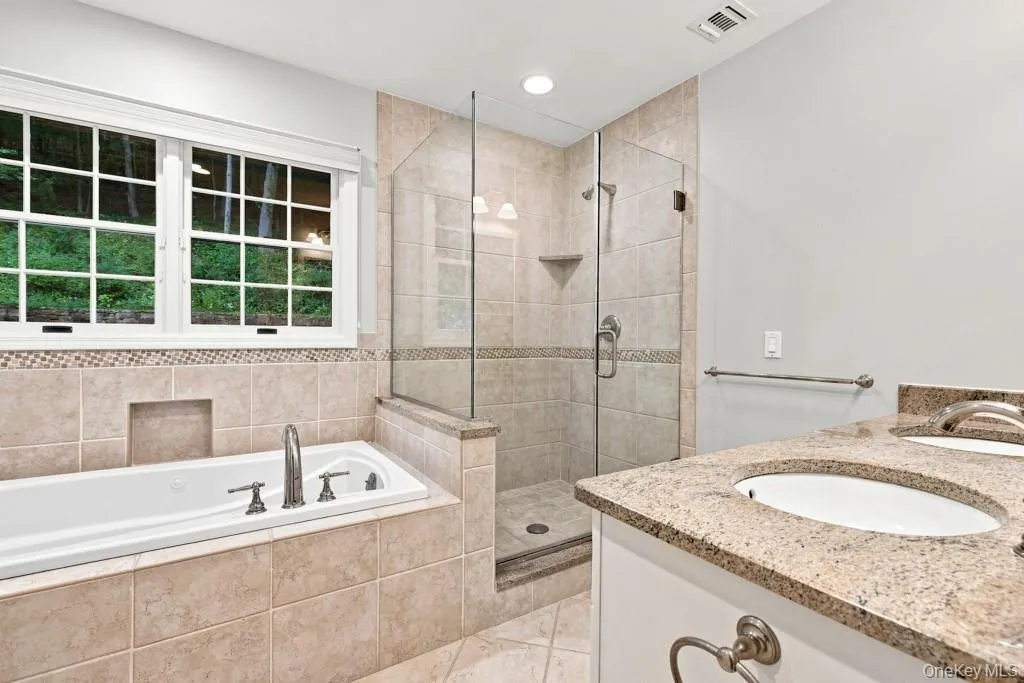 Spa Like Bathroom with Double Sink and Oversized Shower Spa Like Bathroom with Double Sink and Oversized Shower