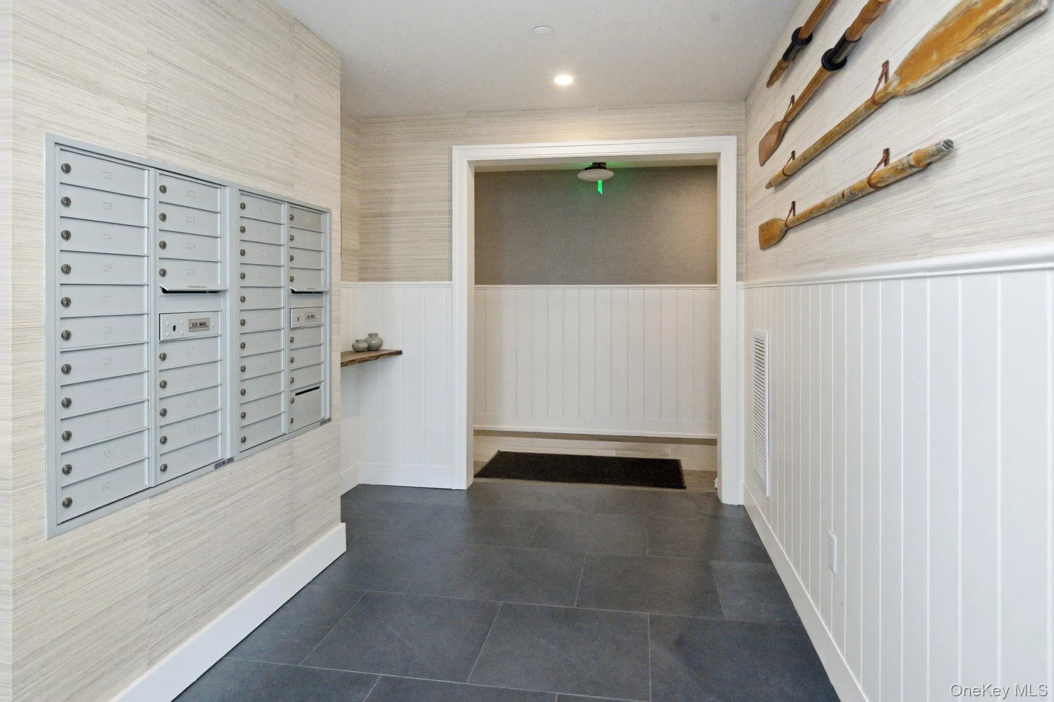 Sleek and functional, the mail and package area at The Hudson reflects the quality craftsmanship carried throughout every corner of the building. Sleek and functional, the mail and package area at The Hudson reflects the quality craftsmanship carried throughout every corner of the building.