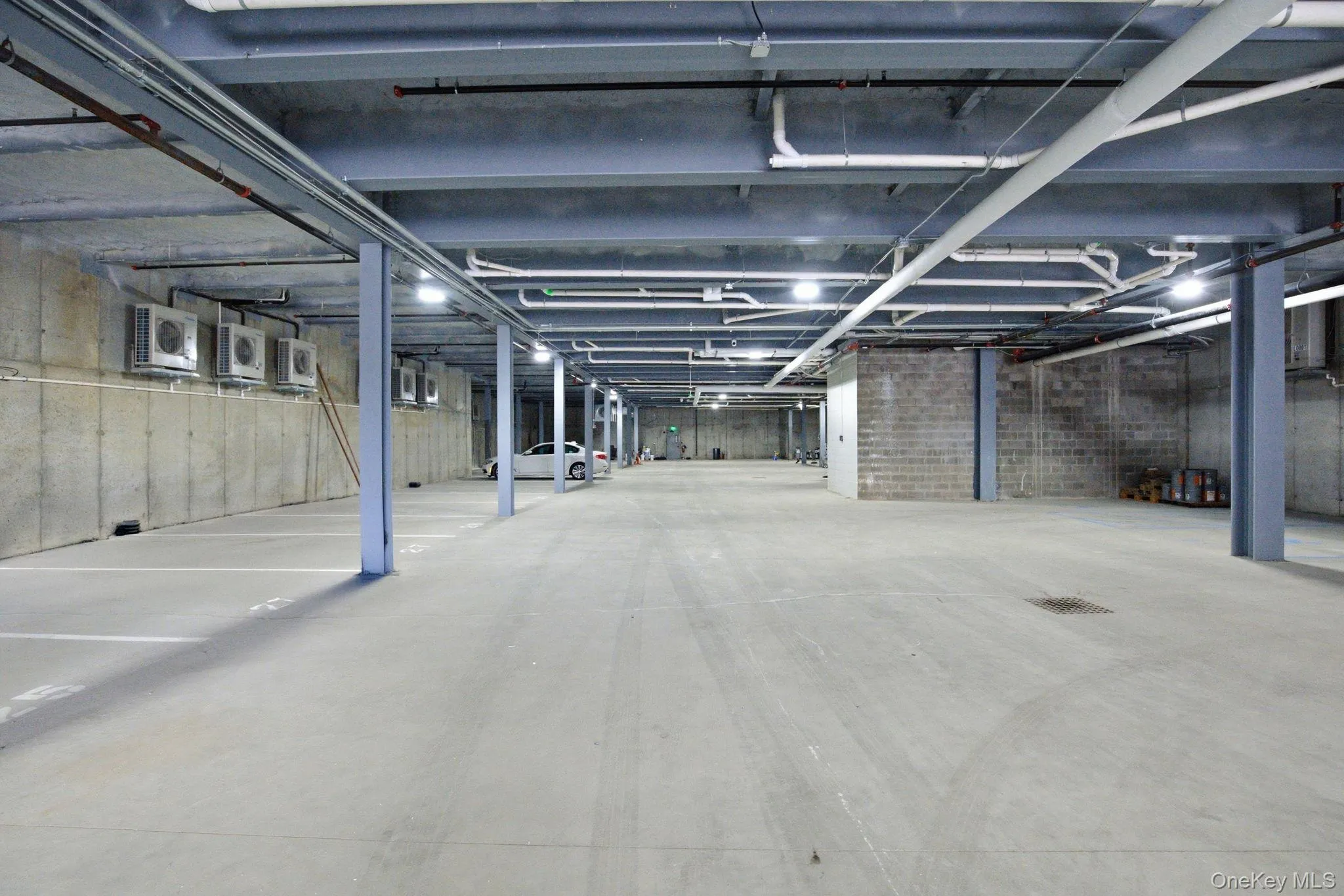 Expansive garage layout offers easy maneuverability and well-organized parking within a professionally maintained setting. Expansive garage layout offers easy maneuverability and well-organized parking within a professionally maintained setting.