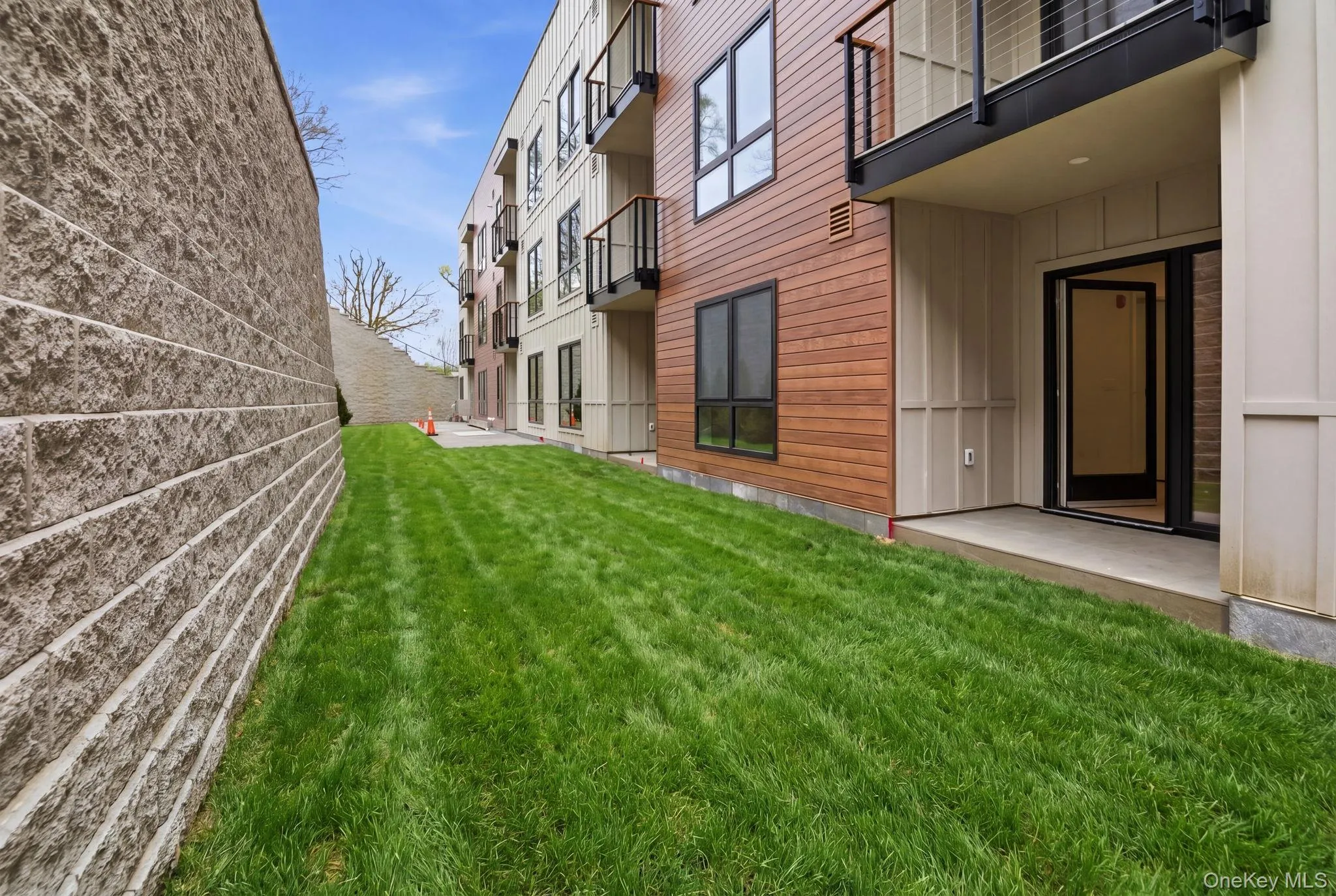 Ground-level outdoor space provides a rare opportunity for private, open-air living within a boutique condominium setting. Ground-level outdoor space provides a rare opportunity for private, open-air living within a boutique condominium setting.
