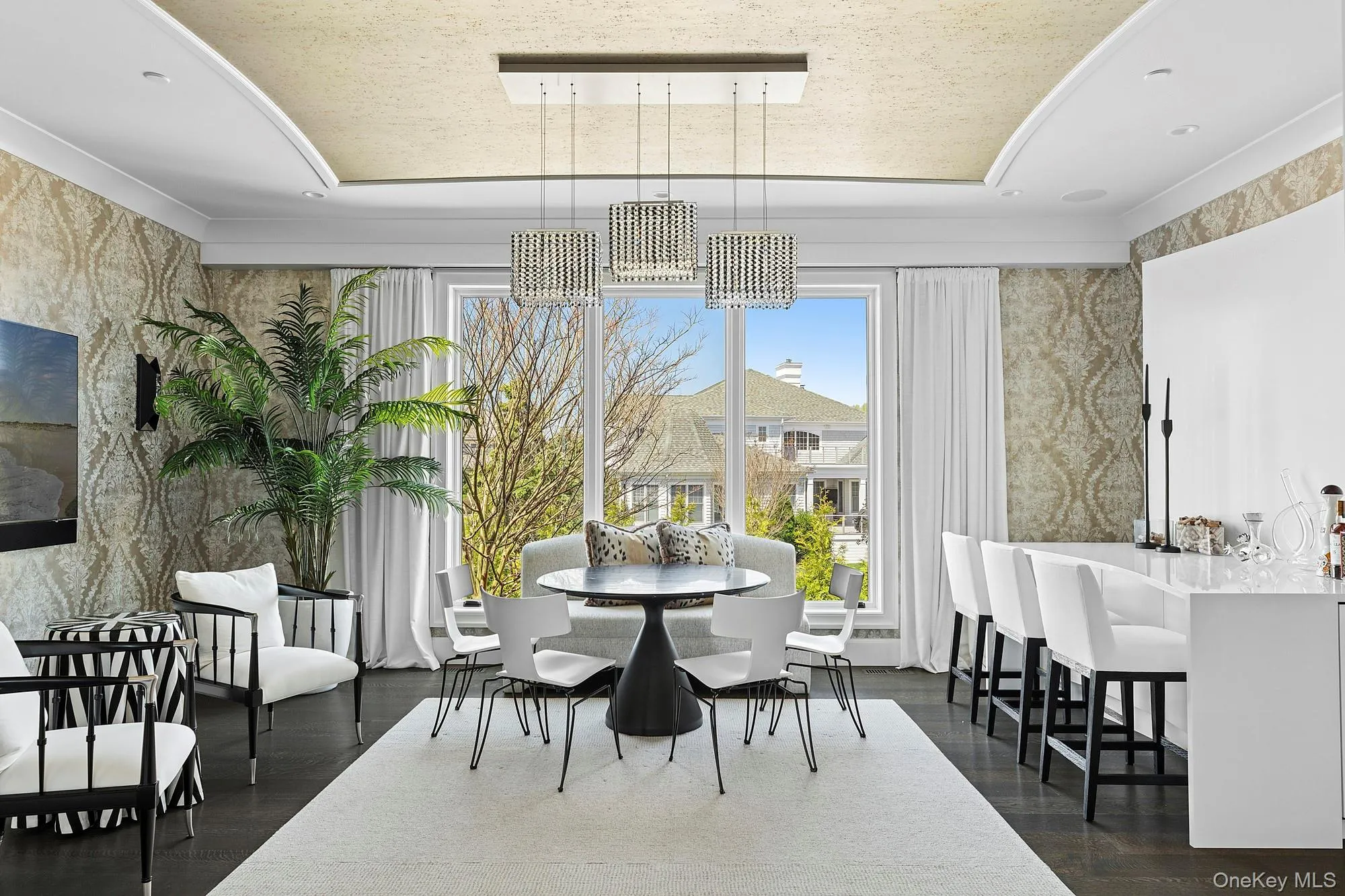 Dining room with a raised ceiling Dining room with a raised ceiling
